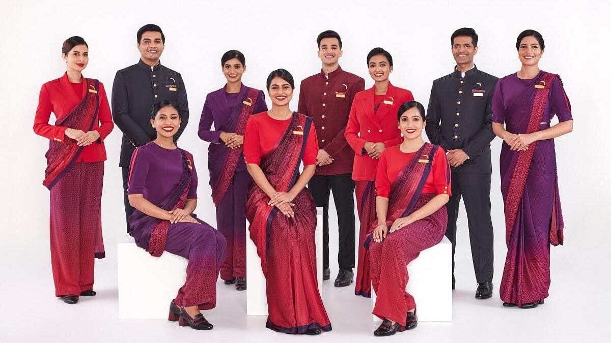 <div class="paragraphs"><p>Air India cabin crew and pilots in their new uniforms, designed by Manish Malhotra, unveiled on Tuesday, Dec. 12, 2023.</p></div>