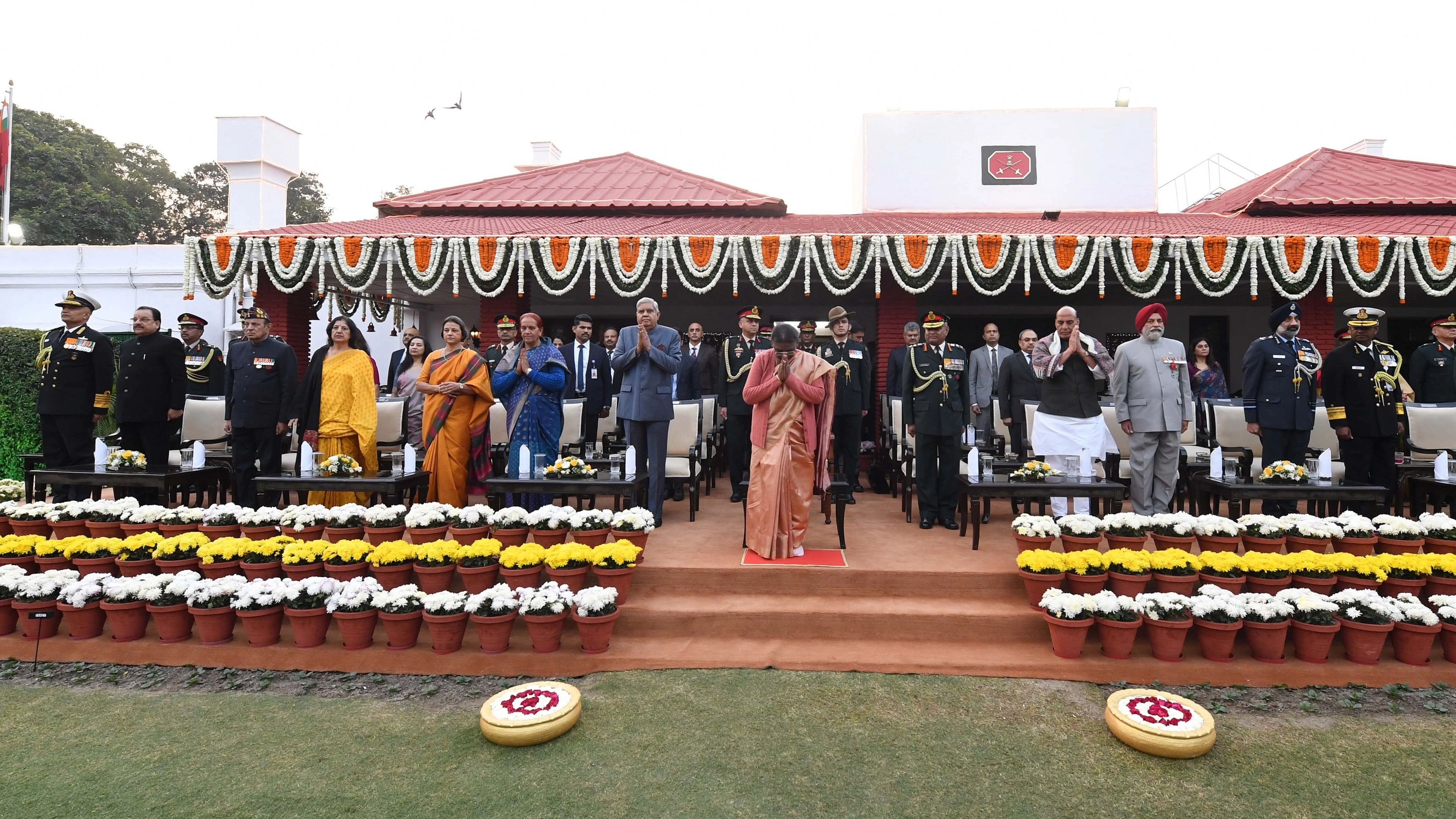 <div class="paragraphs"><p>President Murmu attending&nbsp; 'At Home' reception at Army House on the eve of Vijay Diwas.</p></div>