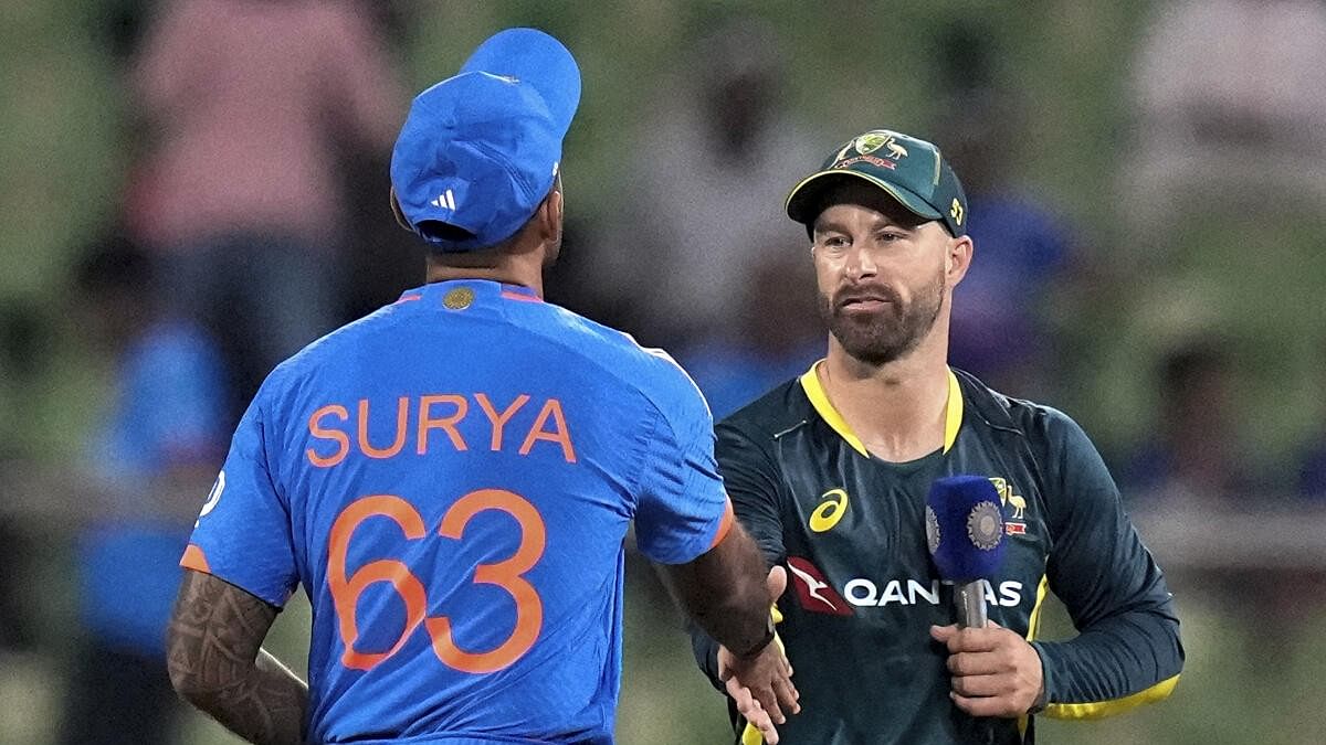 <div class="paragraphs"><p>India's captain Suryakumar Yadav with Australia's captain Matthew Wade</p></div>