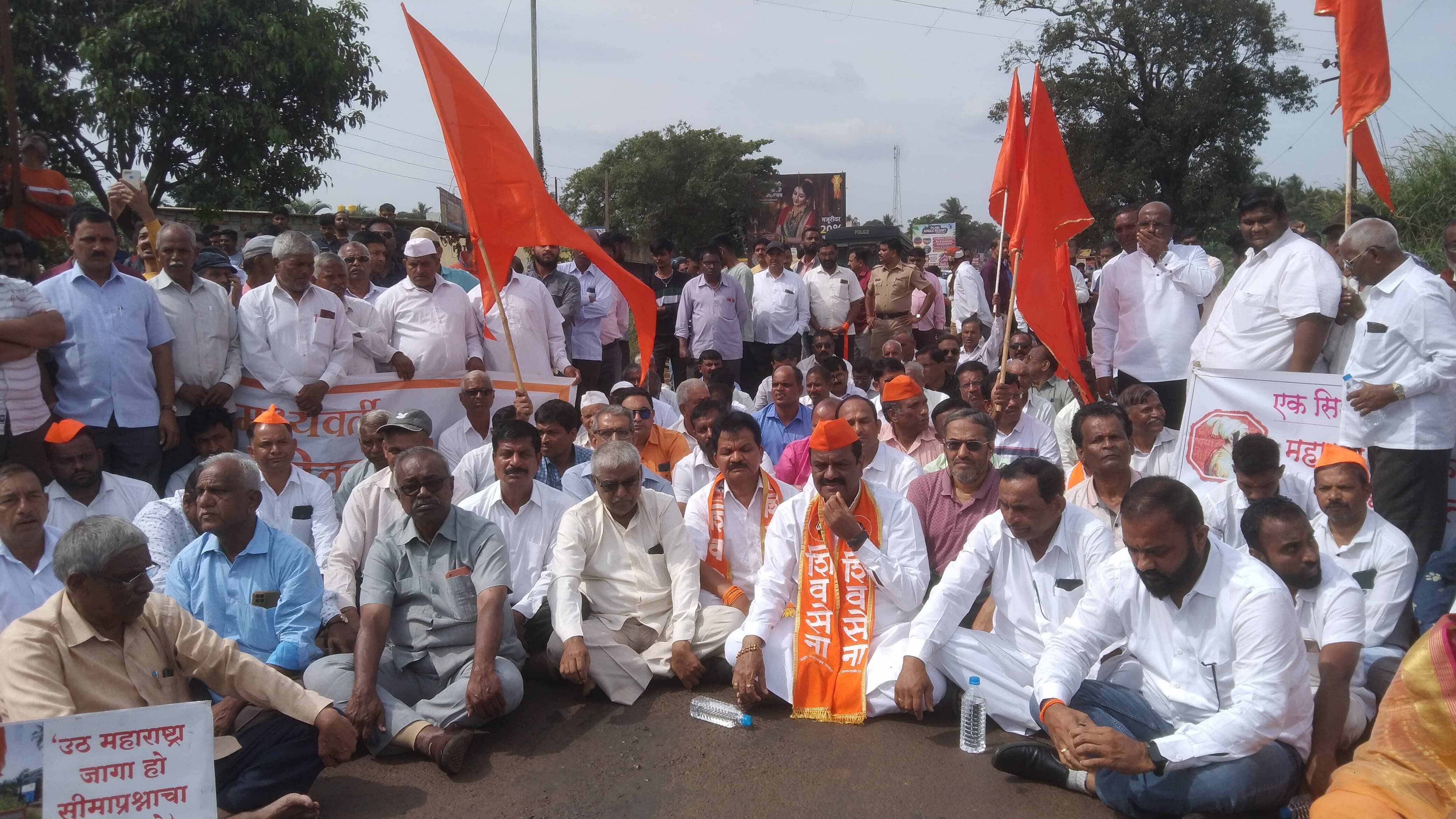 <div class="paragraphs"><p>MES leaders staging rasta roko protest in lieu of ‘maha melava’ (mega convention) at Shinoli village in Chandgad taluk in Kolhapur district of Maharashtra on Monday.</p></div>