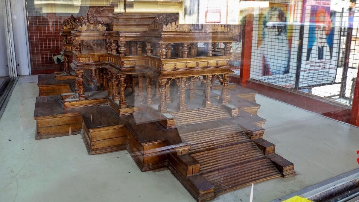 <div class="paragraphs"><p>A wooden model of the 'Ram temple' in a glass encasement, at the Ram Janmabhoomi Nyas-run workshop at Karsevakpuram in Ayodhya. </p></div>