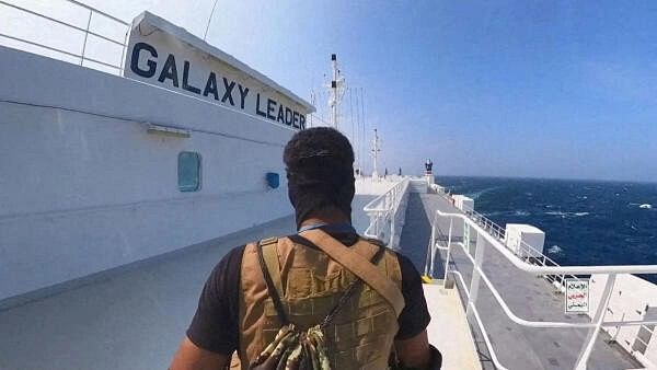 <div class="paragraphs"><p>A Houthi fighter stands on the Galaxy Leader cargo ship in the Red Sea in this photo released last month</p></div>