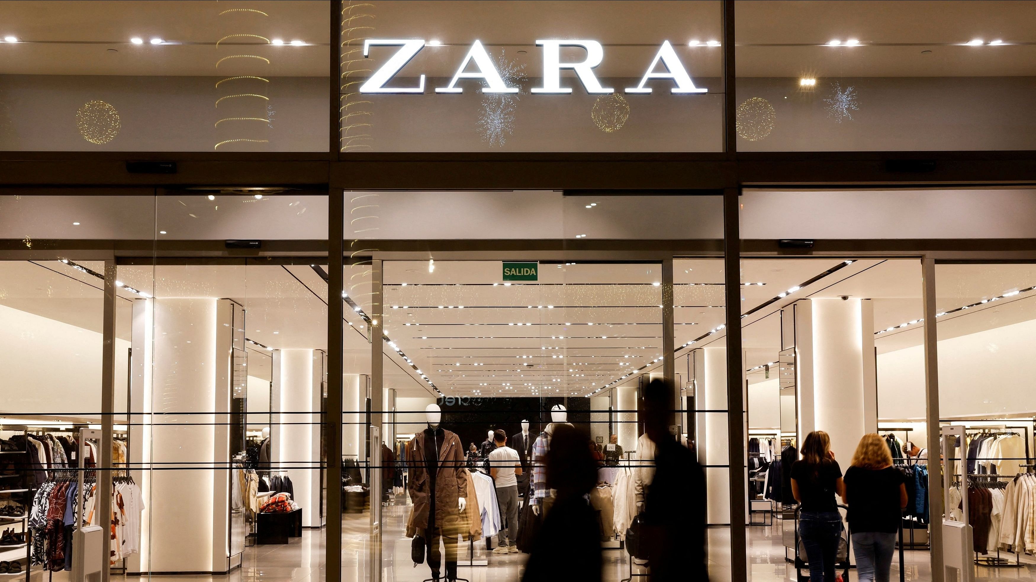 <div class="paragraphs"><p>File photo of shoppers walking past a  Zara clothes store.</p></div>