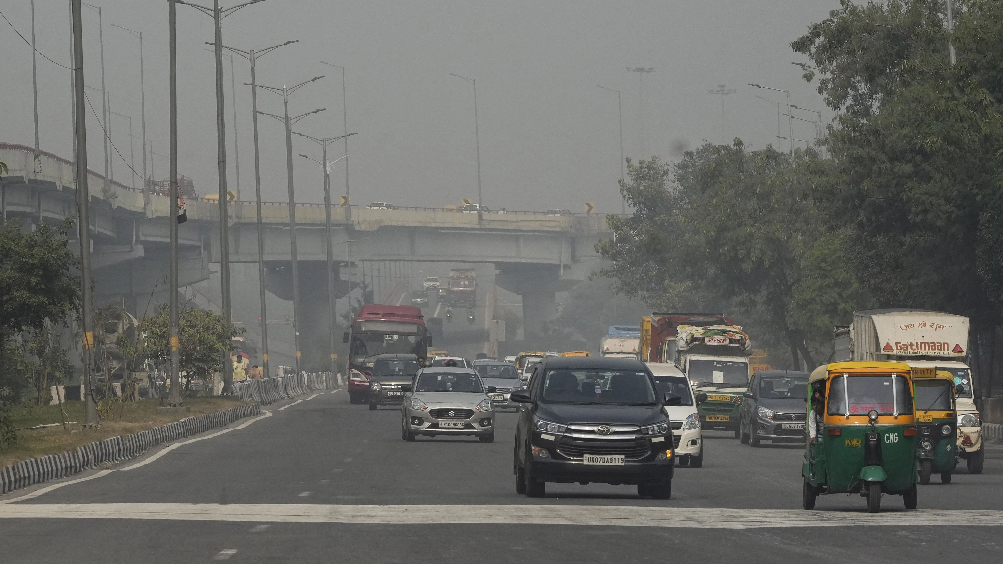 <div class="paragraphs"><p>Commuters on a road amid smog, in New Delhi.</p></div>
