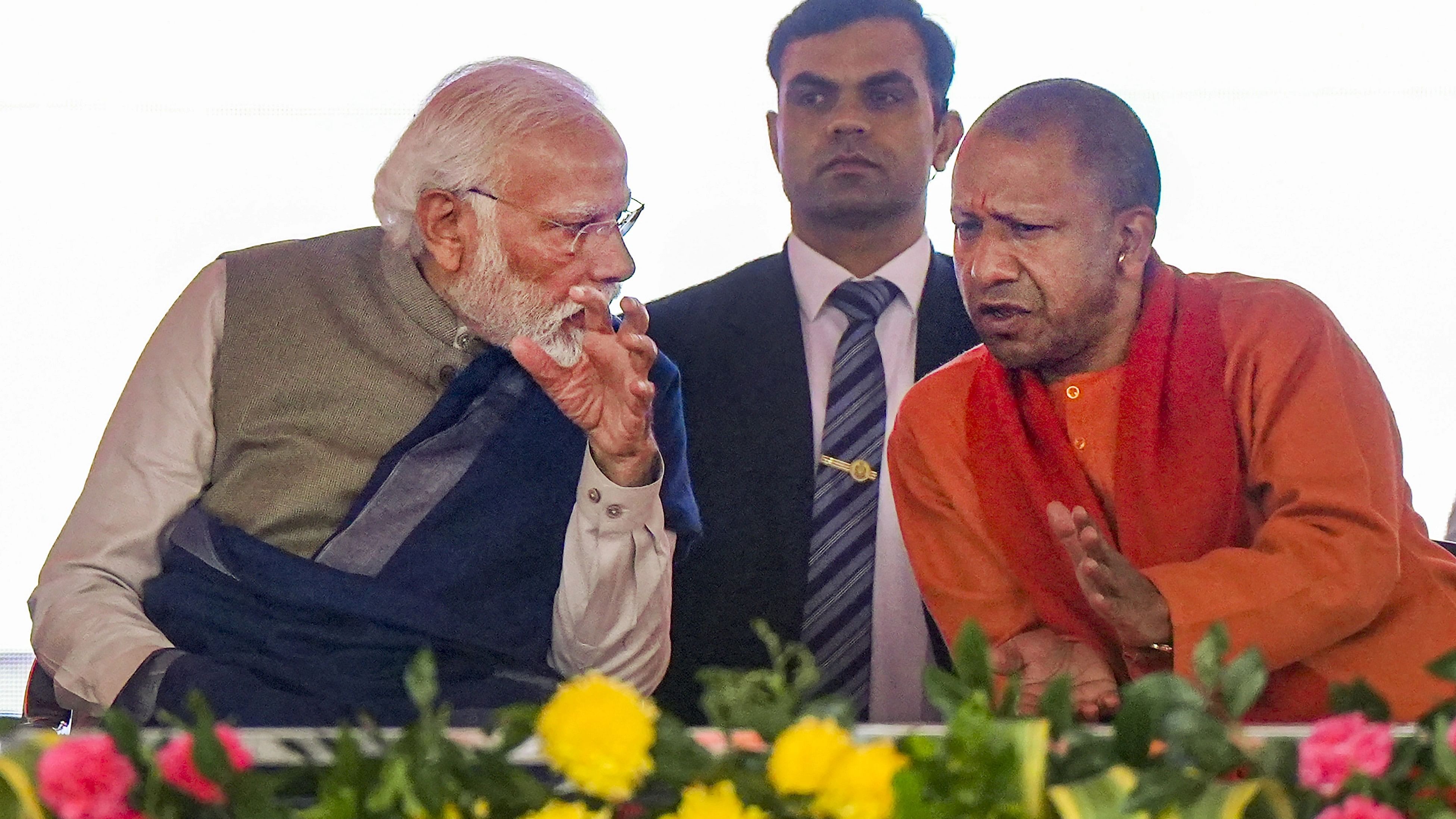 <div class="paragraphs"><p>Prime Minister Narendra Modi with Uttar Pradesh Chief Minister Yogi Adityanath during a public meeting, in Ayodhya, Saturday, Dec. 30, 2023. </p></div>