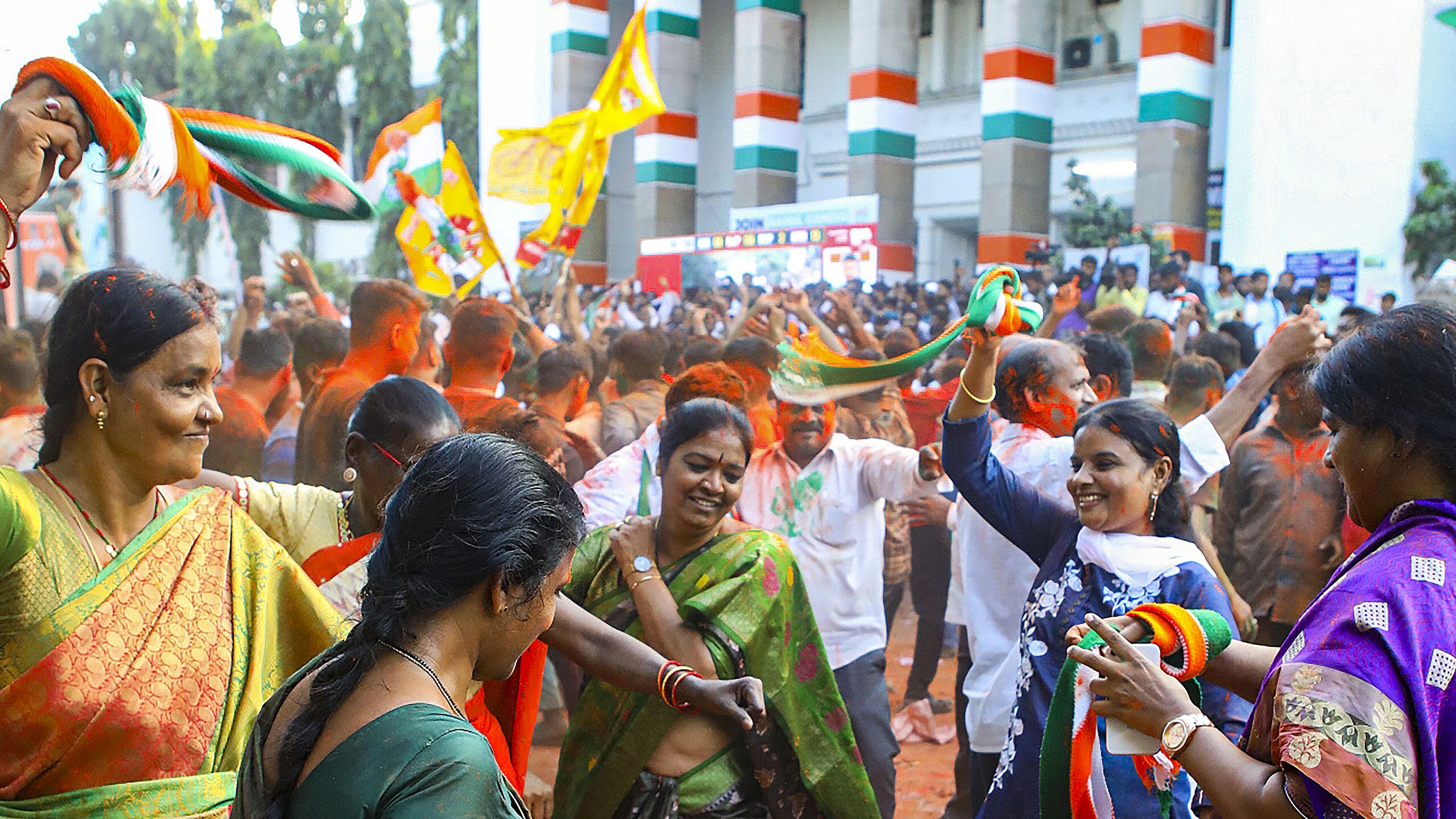 <div class="paragraphs"><p>Congress workers and supporters celebrate the party's lead during counting of votes for Telangana Assembly elections, outside Gandhi Bhavan in Hyderabad, Sunday, Dec. 3, 2023.</p></div>