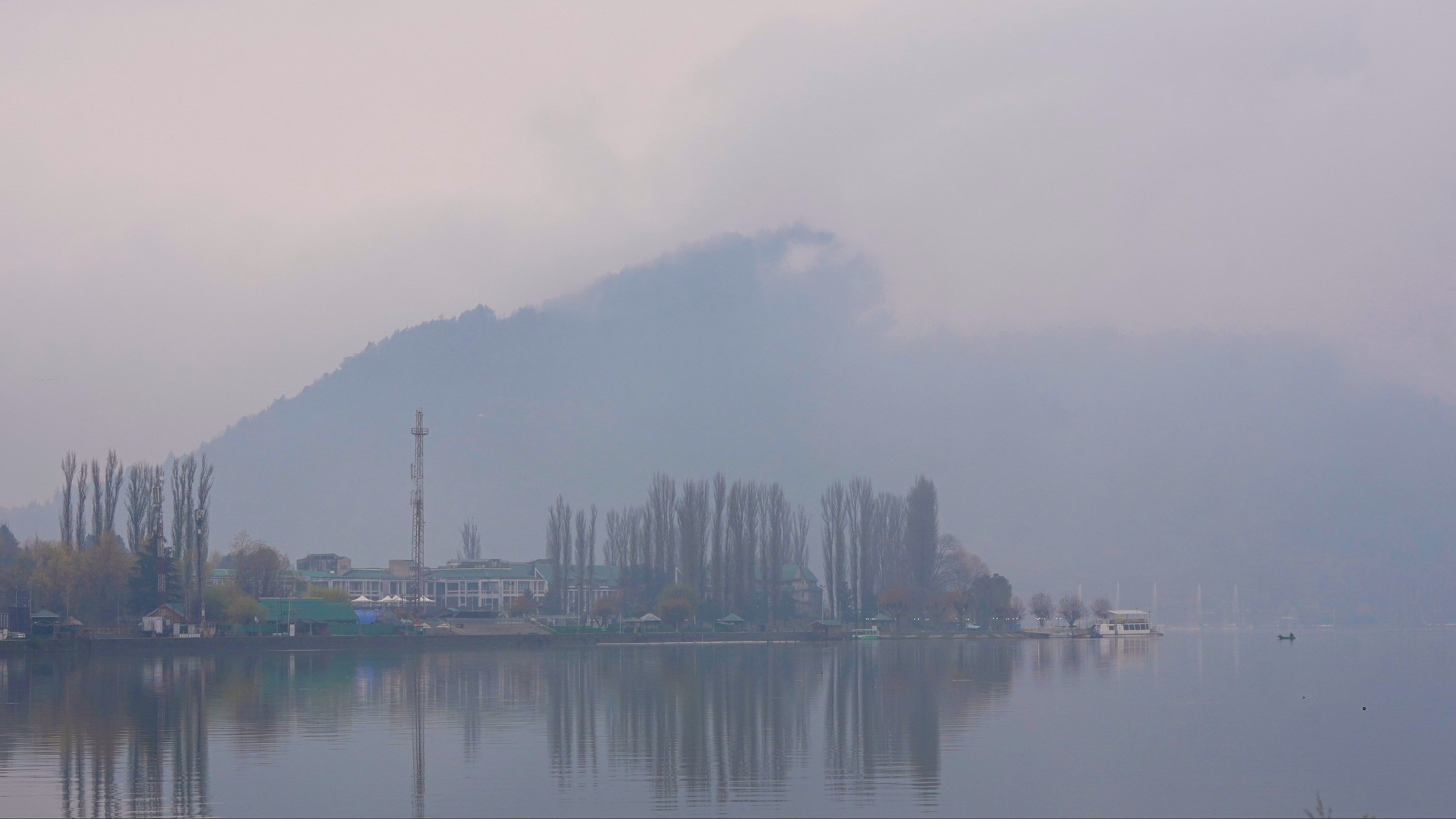 <div class="paragraphs"><p>A view of Dal Lake amid rain, in Srinagar.&nbsp;</p></div>