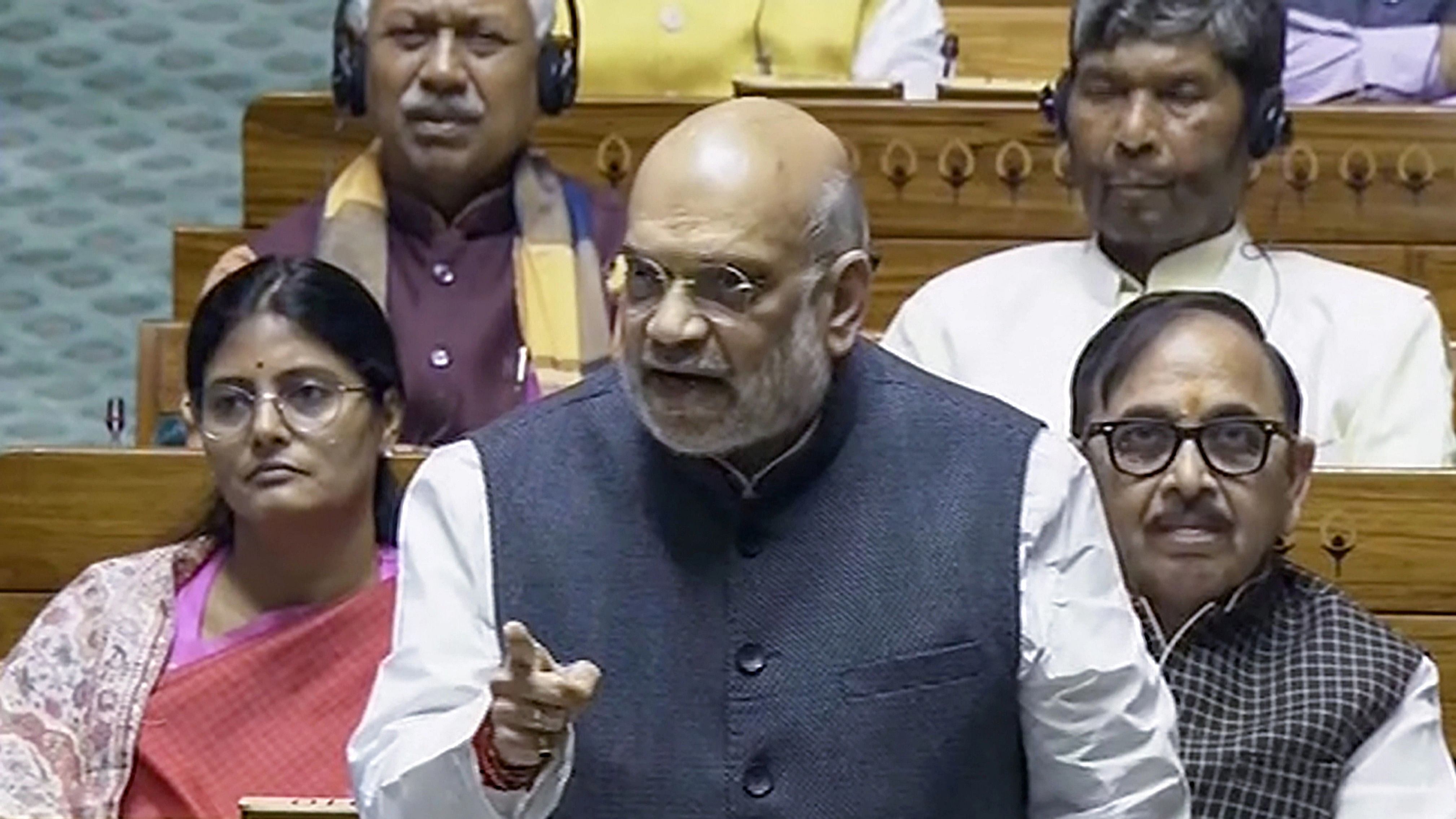 <div class="paragraphs"><p>Union Home Minister Amit Shah speaks in the Lok Sabha during the Winter session of Parliament, in New Delhi, Tuesday, Dec. 5, 2023.</p></div>