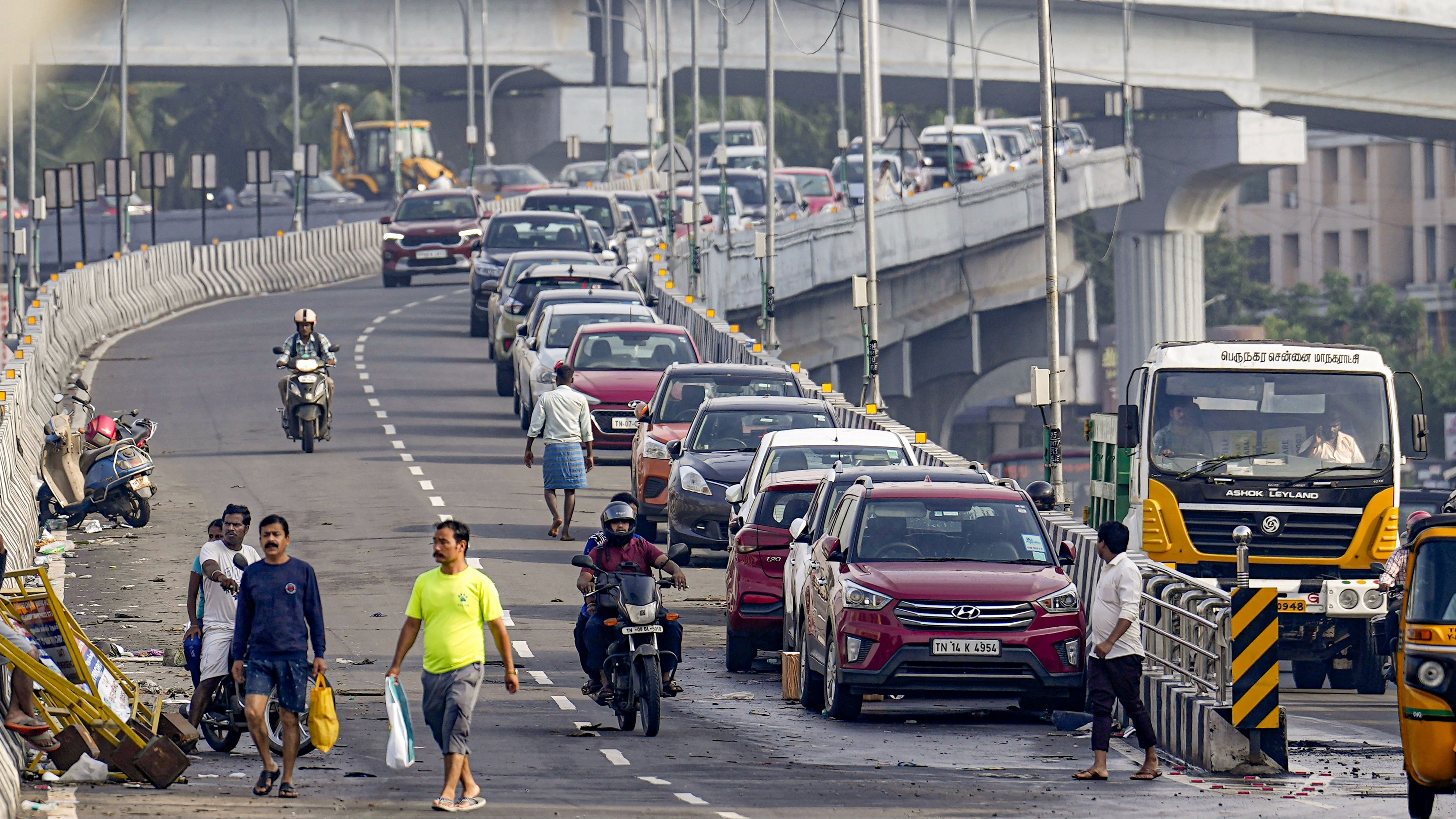 <div class="paragraphs"><p>Vehicles being parked at a flyover amid floods after heavy rainfall in the aftermath of Cyclone Michaung, in Chennai.&nbsp;</p></div>