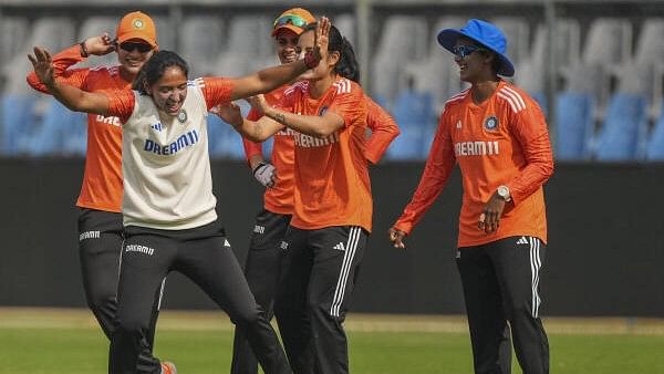 <div class="paragraphs"><p>India's captain Harmanpreet Kaur with teammates during a practice session ahead of the one-off Test cricket match with Australia.</p></div>
