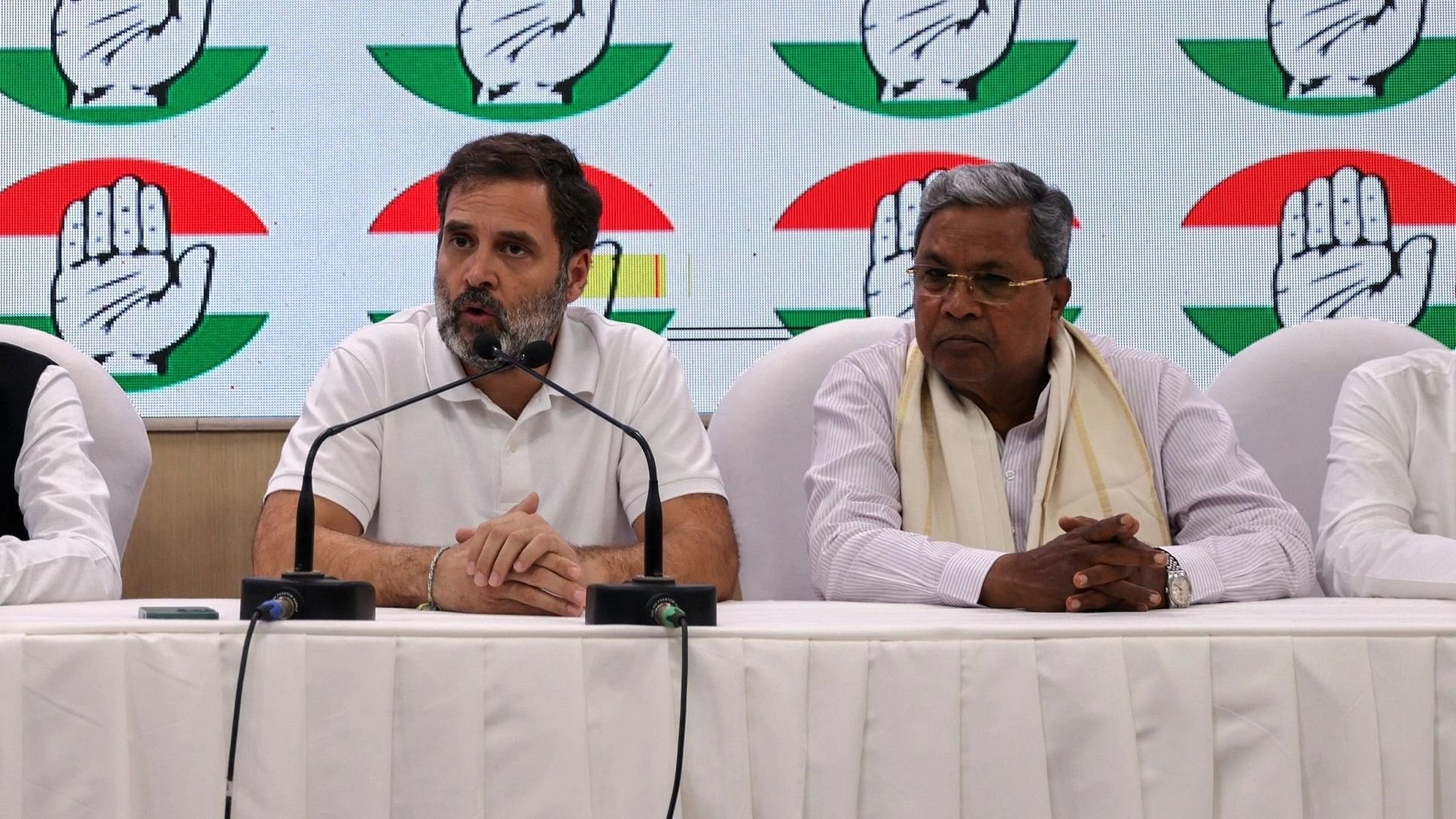 <div class="paragraphs"><p>Rahul Gandhi (left) with Siddaramaiah.</p></div>