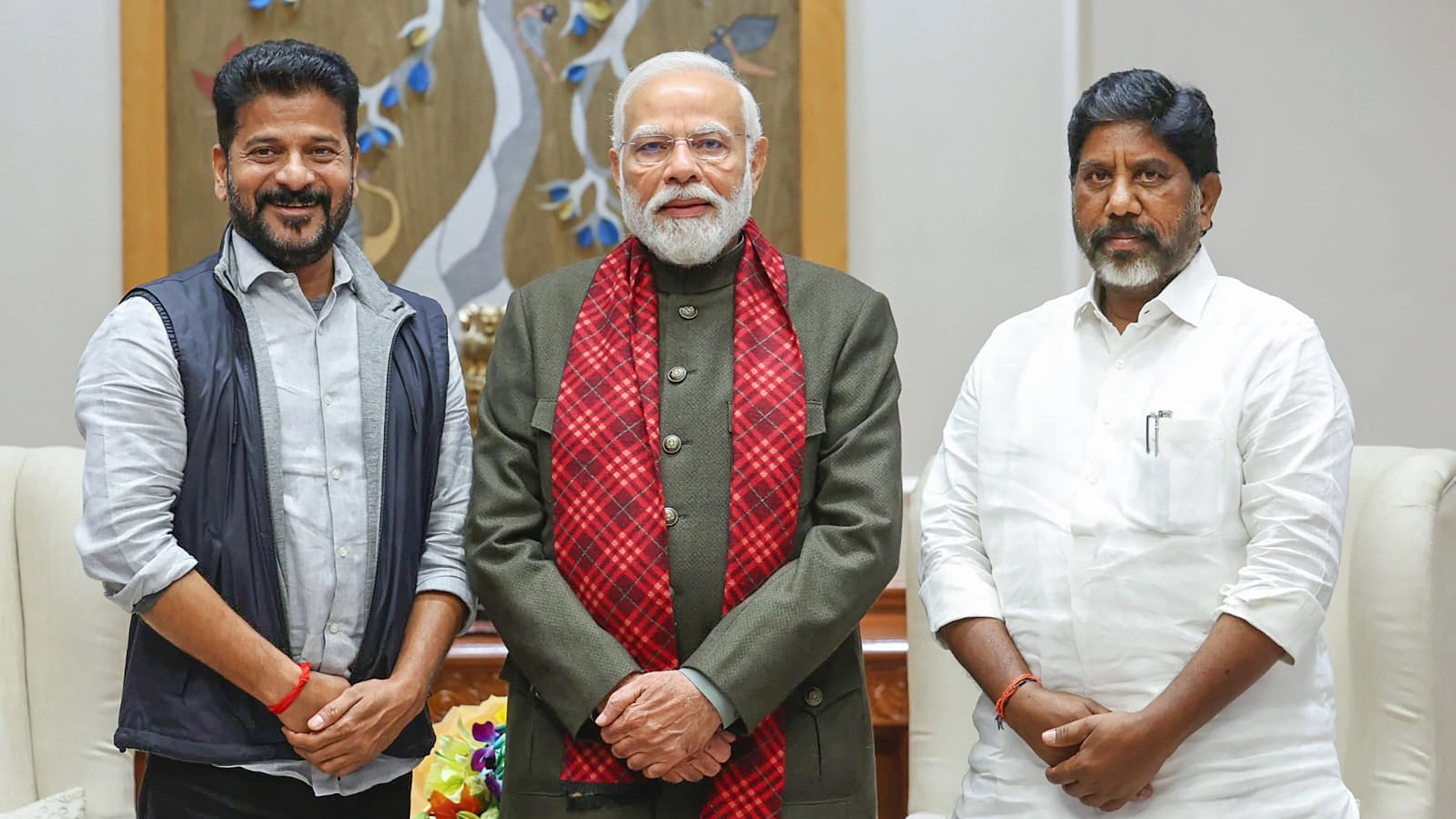 <div class="paragraphs"><p>Prime Minister Narendra Modi is flanked by Telangana Chief Minister A Revanth Reddy (left) and his deputy Bhatti Vikramarka.</p></div>