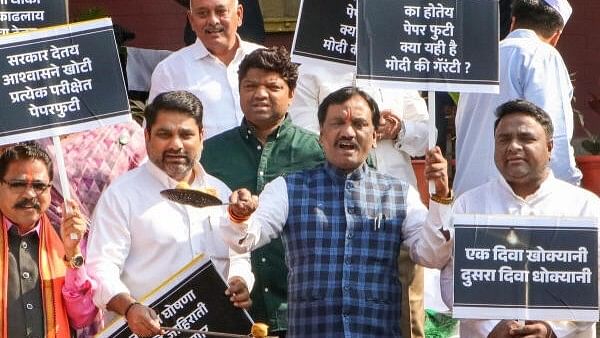 <div class="paragraphs"><p>Leader of Opposition in Maharashtra Legislative Council Ambadas Danve along with other leaders stages a protest against the state government during the Winter session of Maharashtra Assembly, in Nagpur, Friday, Dec 15.</p></div>