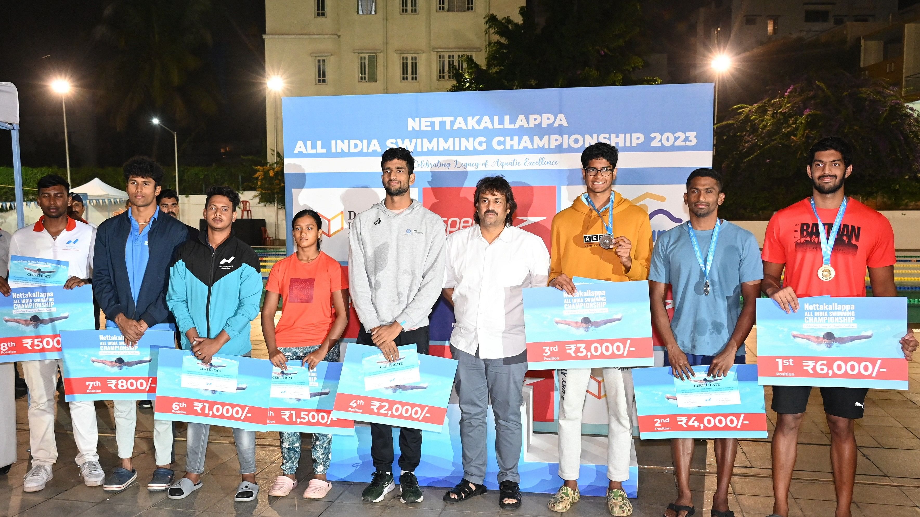<div class="paragraphs"><p>Top-eight swimmers of the women's 50m butterfly SKINS event of the Nettakallappa All India Swimming Championship at the Nettakallappa Aquatic Centre in Bengaluru on Saturday. KNEELING (from left): Janya BS, Thithikshaa Hanumantharaj, Shrigouri Hebbar, Tisya Sonar. STANDING: Charita Phanindranath, Naisha Shetty, Ridhima Veerendrakumar, Nina Venkatesh. </p></div>