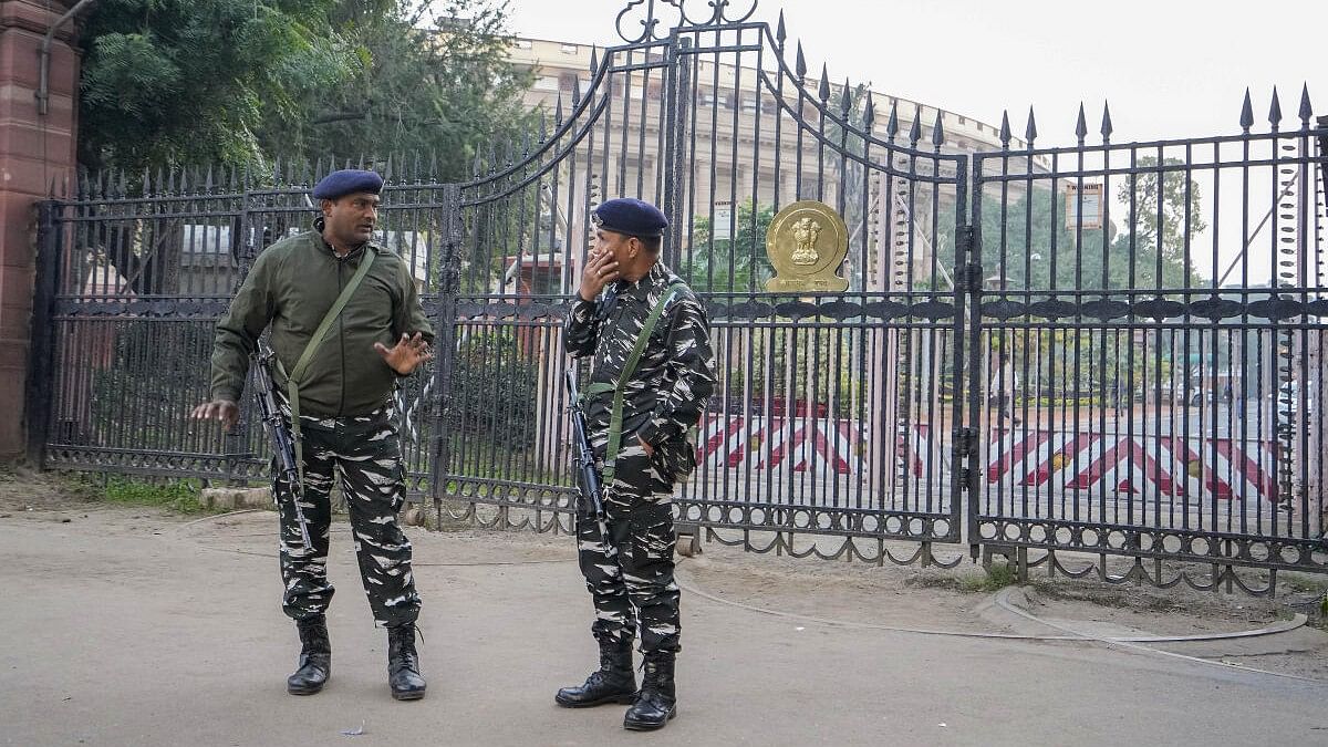 <div class="paragraphs"><p>Security personnel stand guard outside the Parliament House complex during the Winter session, in New Delhi, Wednesday, Dec. 13, 2023</p></div>