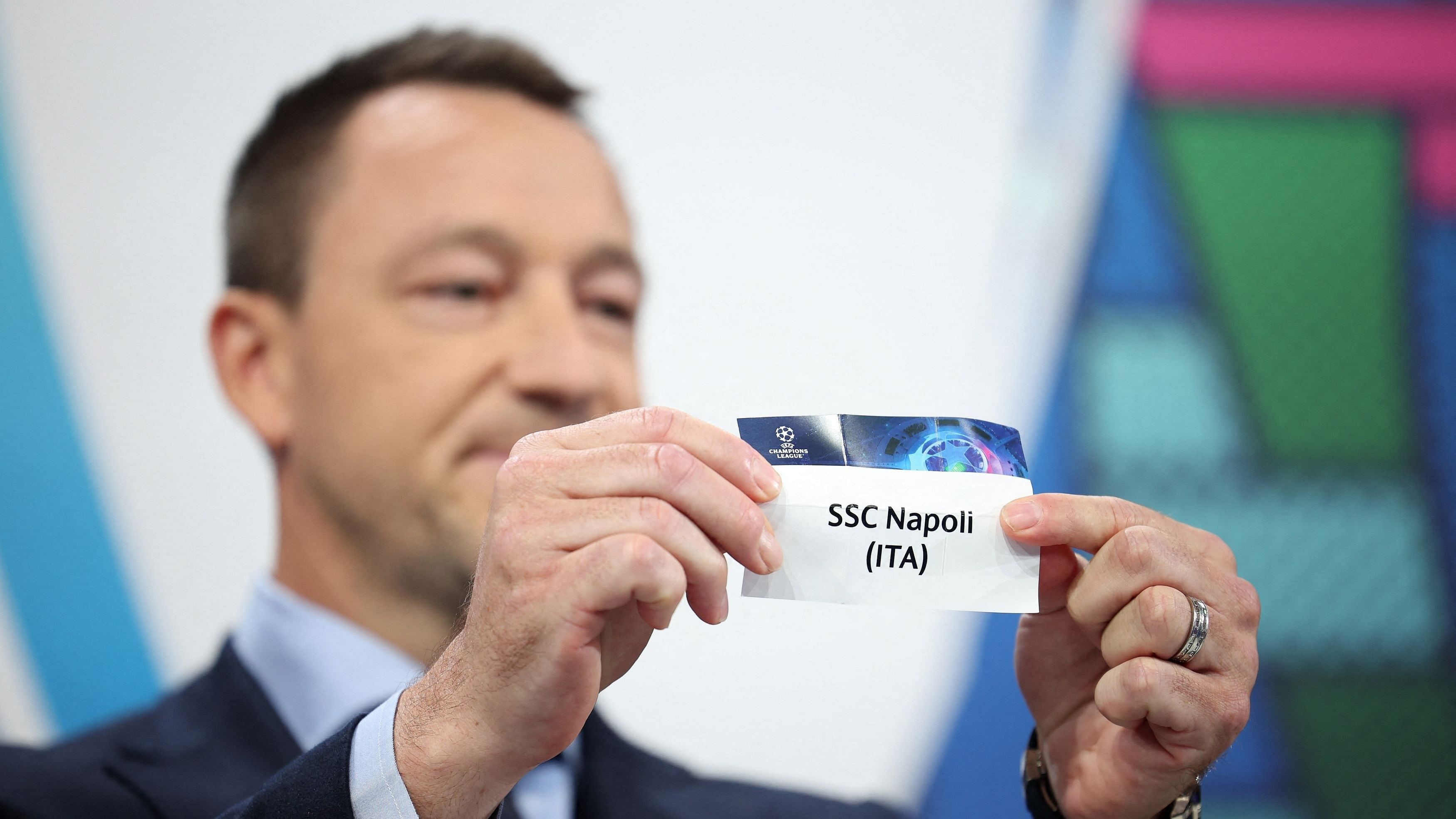 <div class="paragraphs"><p>Former Chelsea player John Terry conducts the Champios League draw.</p></div>