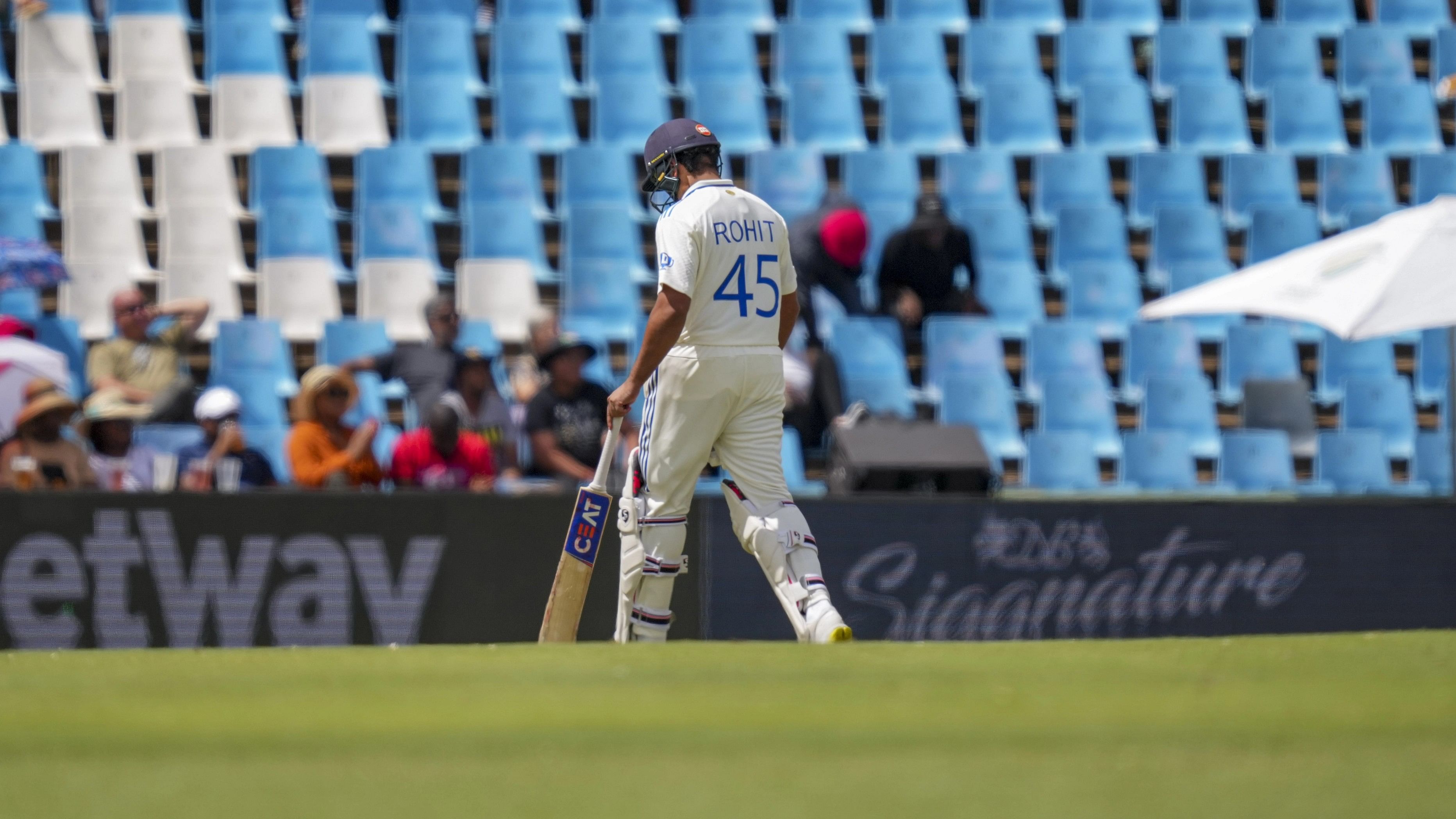 <div class="paragraphs"><p>Rohit Sharma walks off the field after his dismissal during the third day of the first Test cricket match between India and South Africa, at SuperSport Park Stadium, in Centurion, Thursday, Dec. 28, 2023. </p></div>