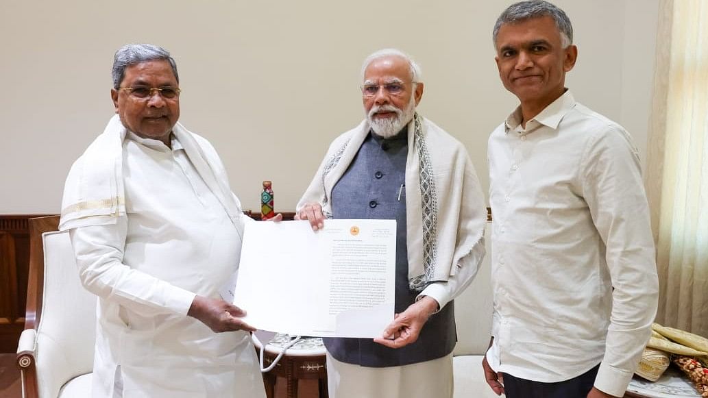 <div class="paragraphs"><p>Karnataka CM Siddaramaiah with Prime Minister Narendra Modi.</p></div>