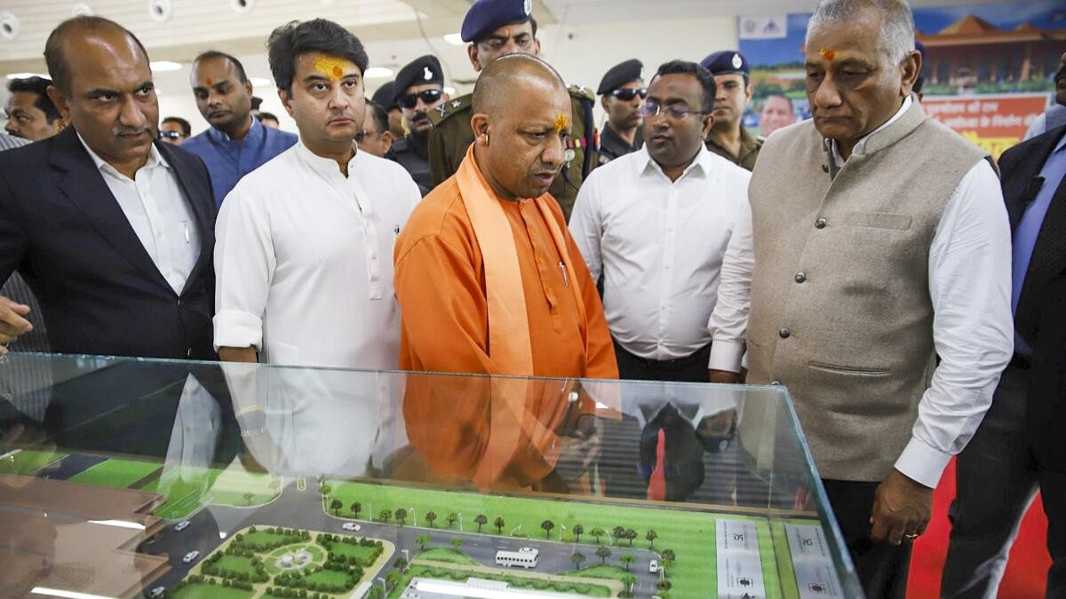 <div class="paragraphs"><p>Uttar Pradesh Chief Minister Yogi Adityanath, Union Minister for Civil Aviation Jyotiraditya Scindia and Union Minister of State for Civil Aviation VK Singh during the inspection of the under-construction Maryada Purushottam Shri Ram International Airport, in Ayodhya district, Saturday, Dec. 2, 2023.</p></div>