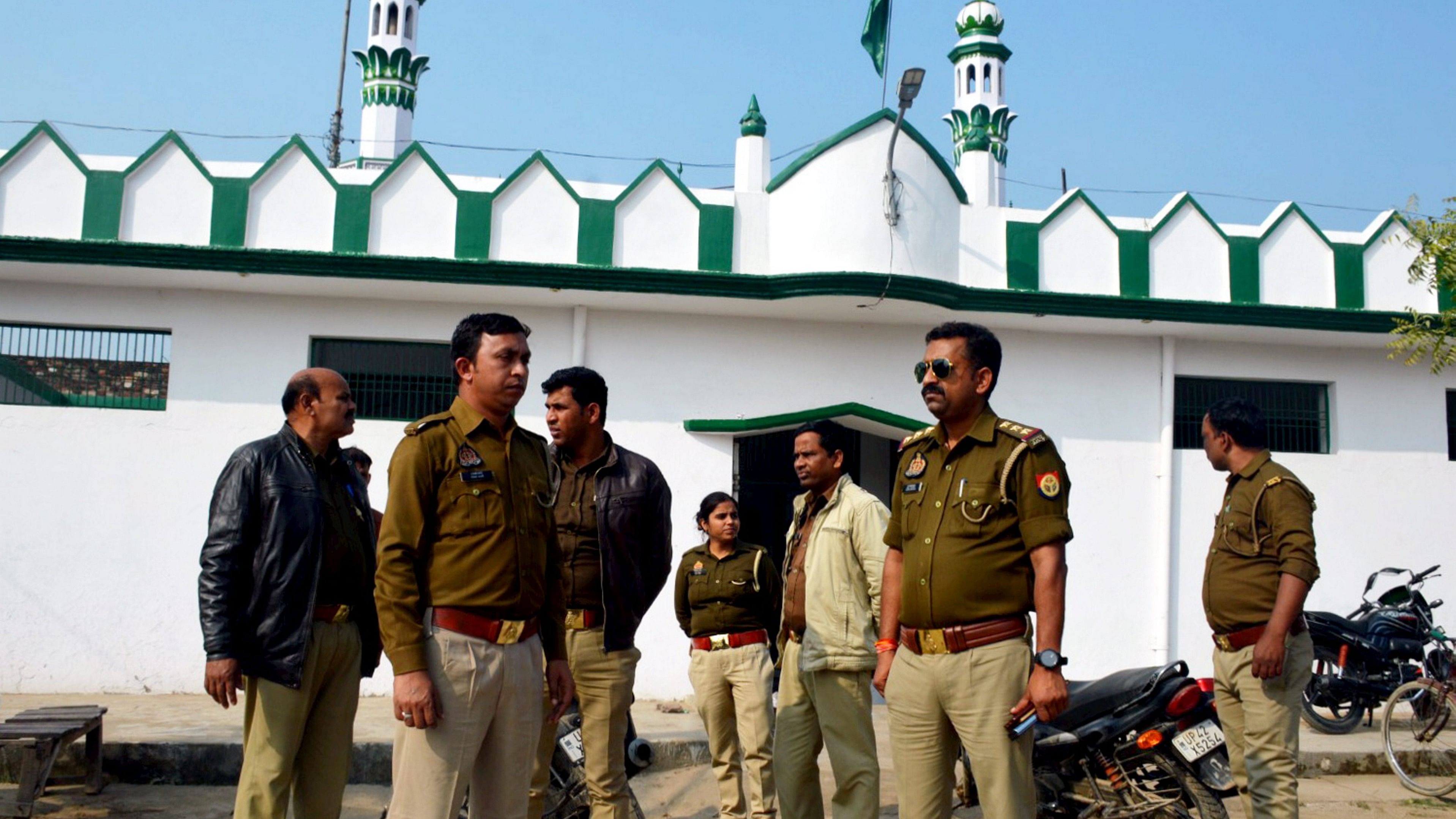 <div class="paragraphs"><p>Security personnel stand guard outside a mosque on the anniversary of the Babri Masjid demolition, in Ayodhya, Wednesday, Dec. 6, 2023.</p></div>