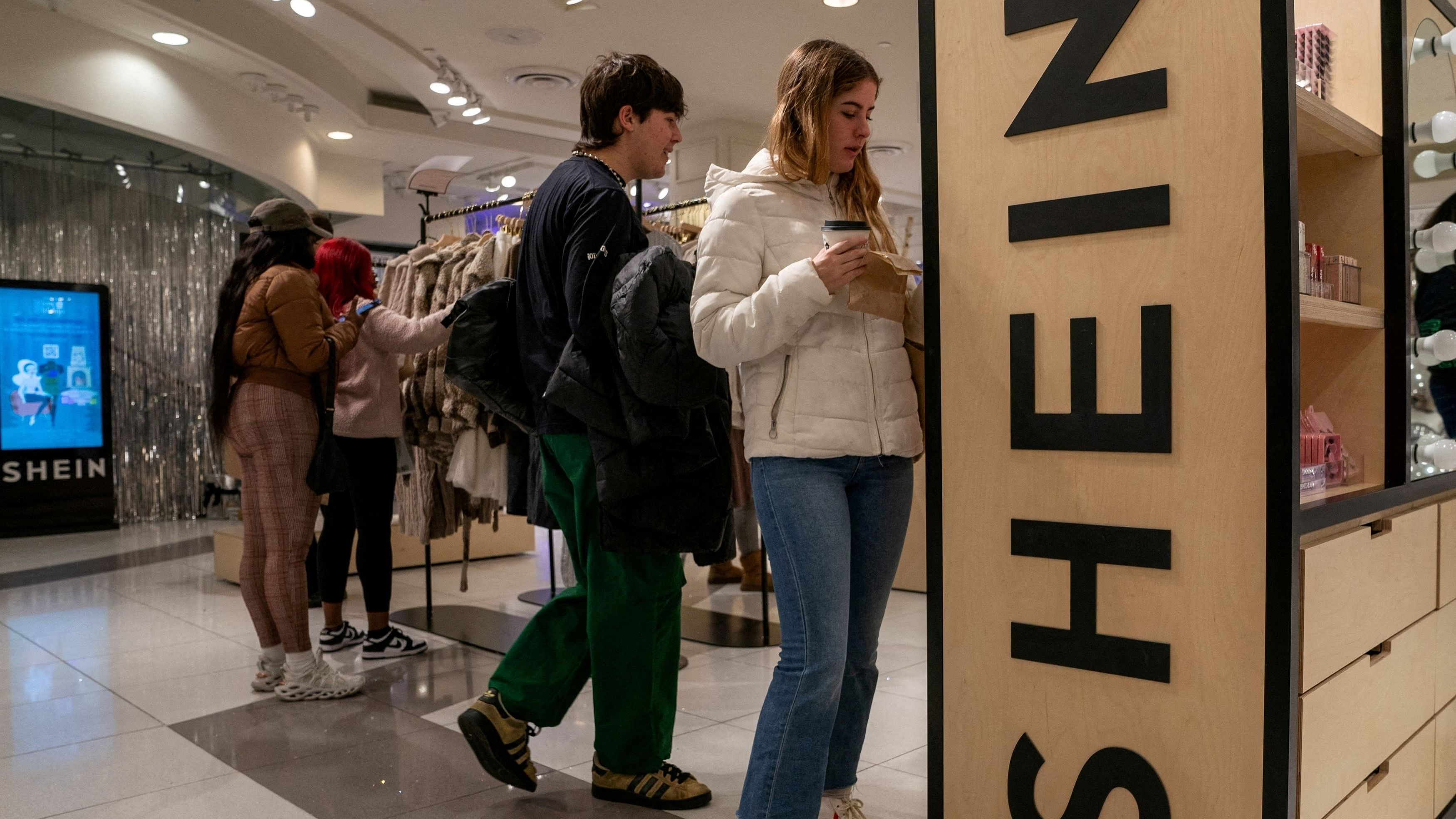 <div class="paragraphs"><p> People shop at the Shein Holiday pop-up shop inside of Times Squares Forever 21 in New York City</p></div>