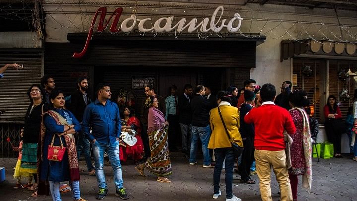 <div class="paragraphs"><p>People lined up outside Mocambo on Park Street in Kolkata during festive season. Representative image.</p></div>
