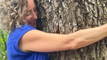 <div class="paragraphs"><p>An image showing&nbsp;Sonja Semyonova hugging a tree.</p></div>