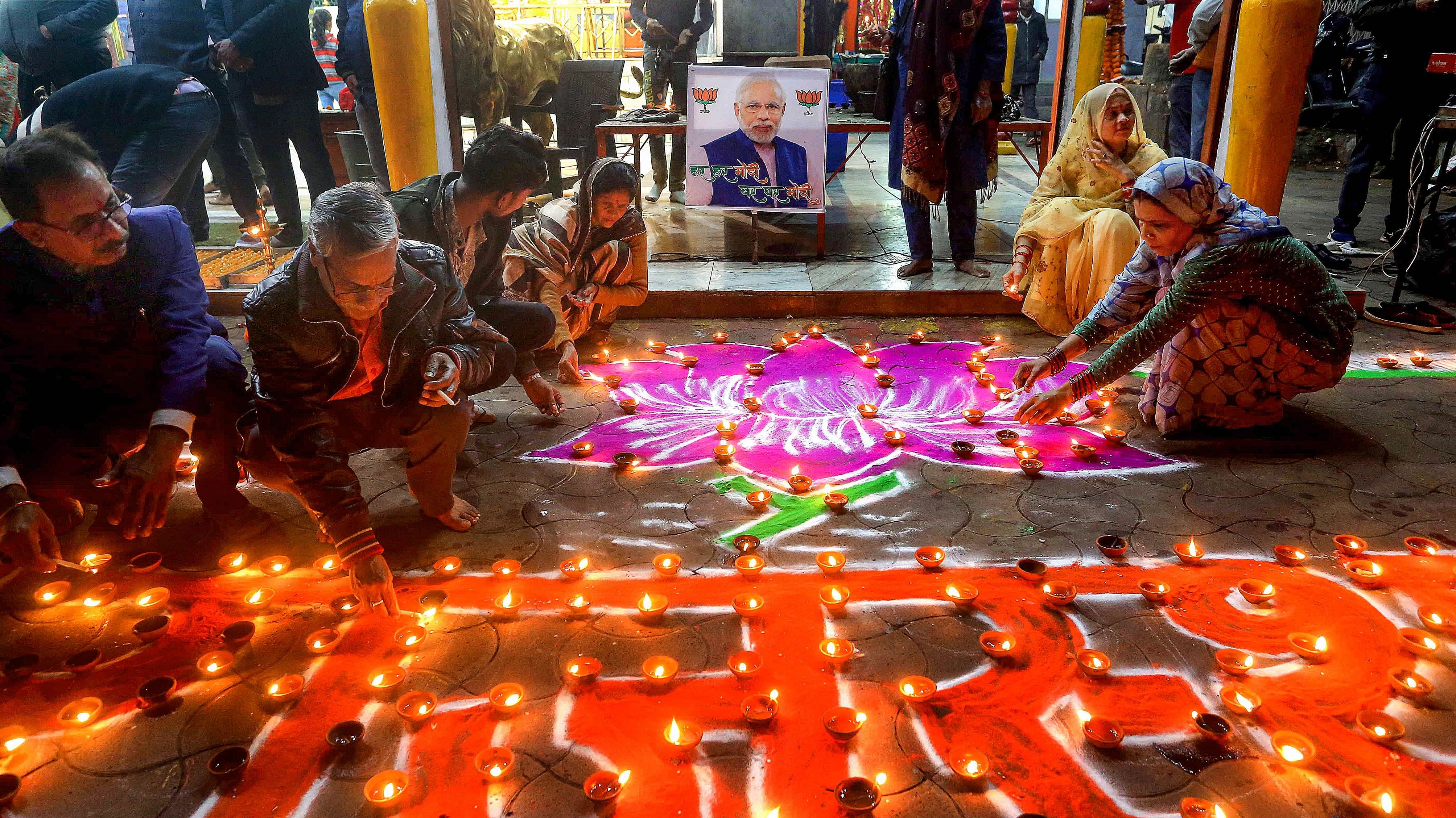 <div class="paragraphs"><p>BJP workers celebrate the party's victory in elections to the Legislative Assemblies of Madhya Pradesh, Rajasthan and Chhattisgarh.</p></div>