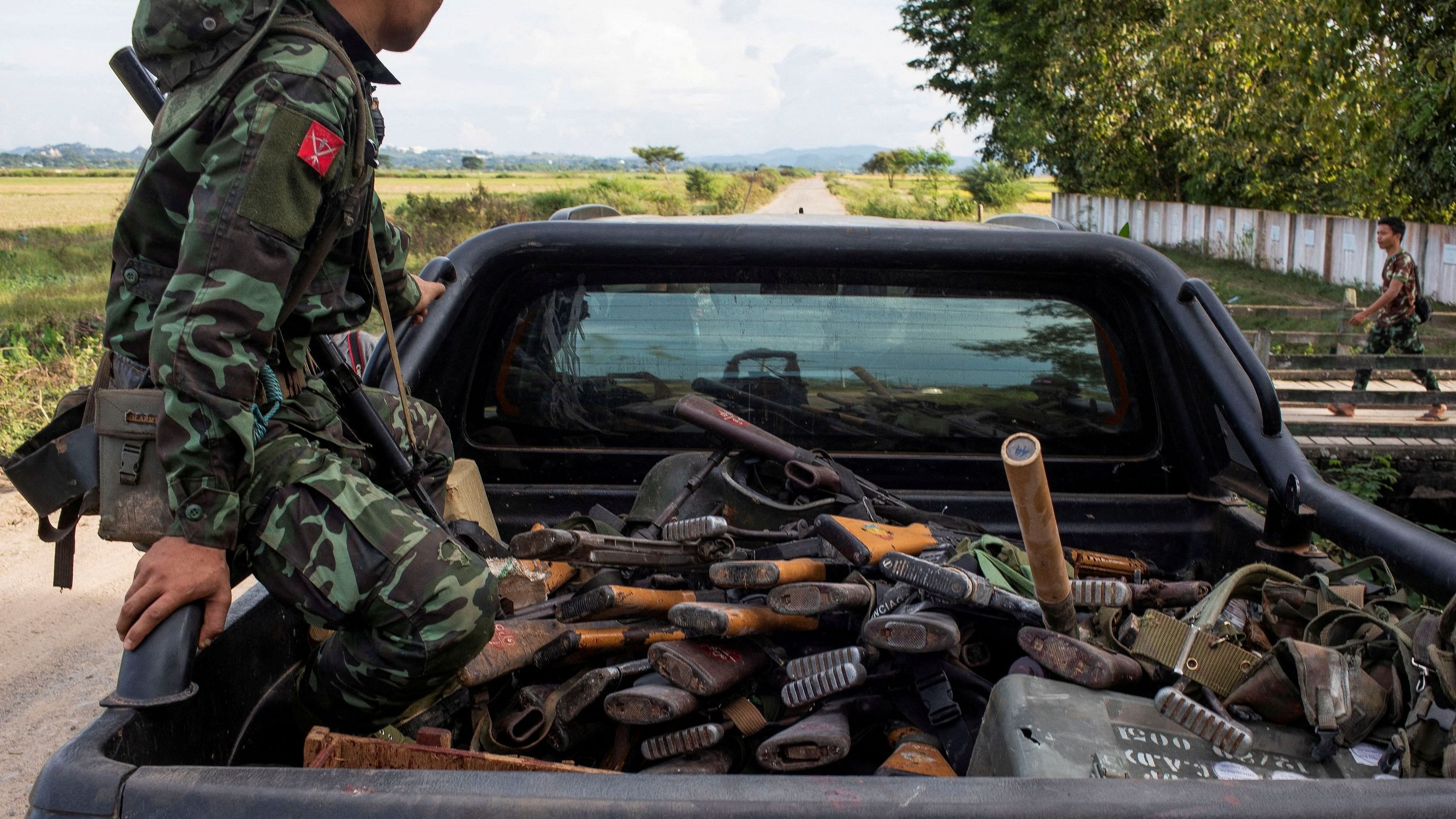 <div class="paragraphs"><p> A member of the Karenni Army rides a truck with seized weapons during a battle in Loikaw in Kayah State, Myanmar.</p></div>