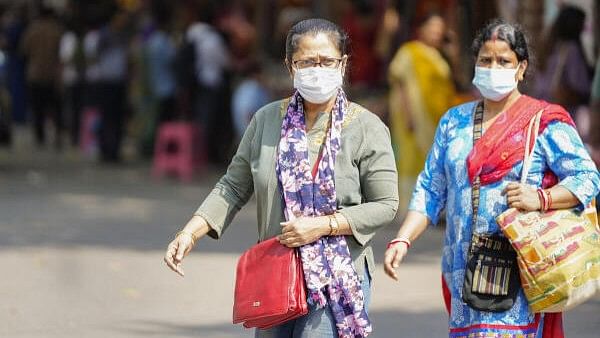 <div class="paragraphs"><p>Image showing women wearing masks amid rise in Covid-19 cases at the Connaught Place, in New Delhi.</p></div>
