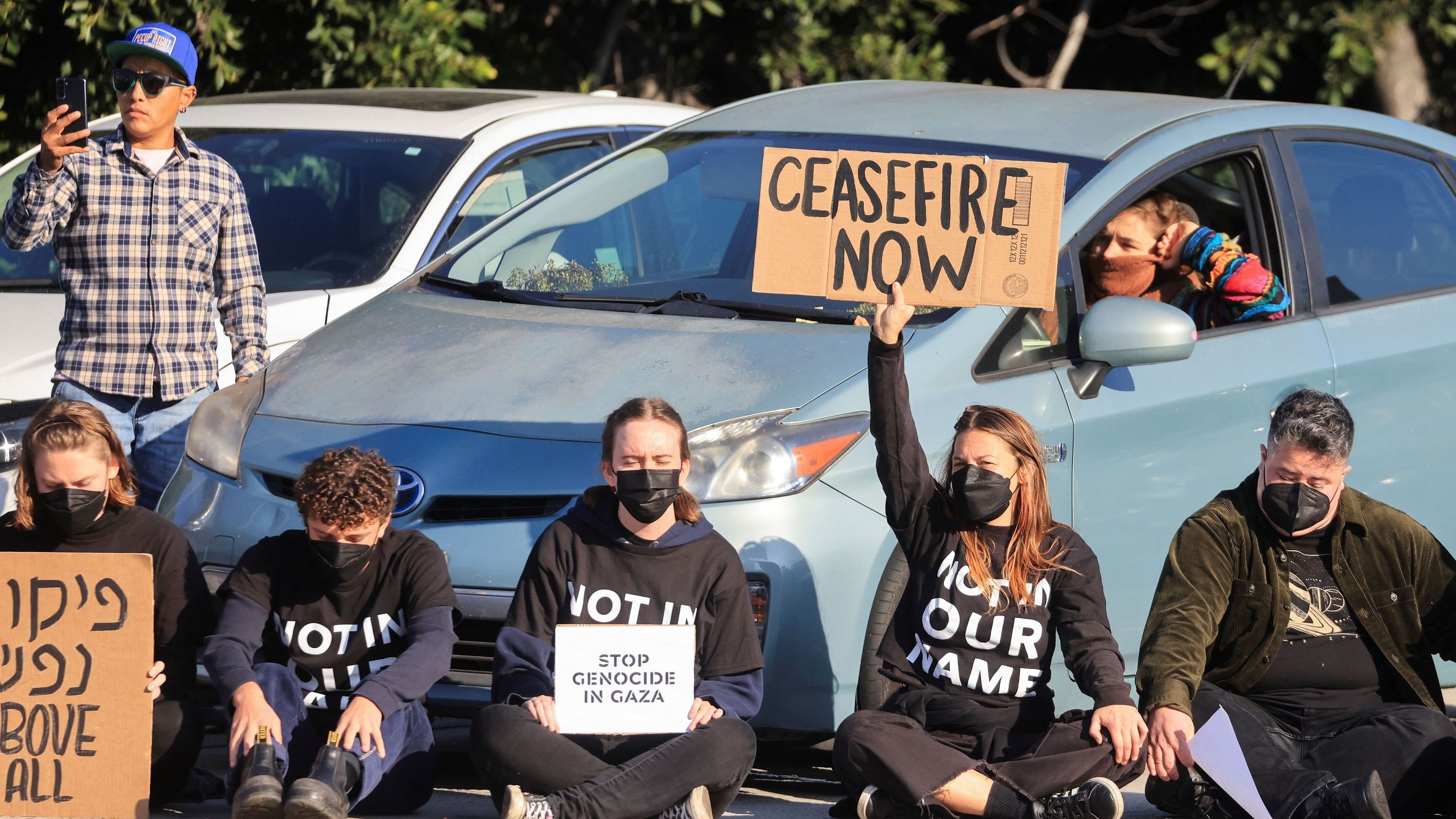 <div class="paragraphs"><p>Protesters demanding a ceasefire and an end to US support for Israel's attack on Gaza block morning traffic on the 110 Freeway, in Los Angeles.</p></div>