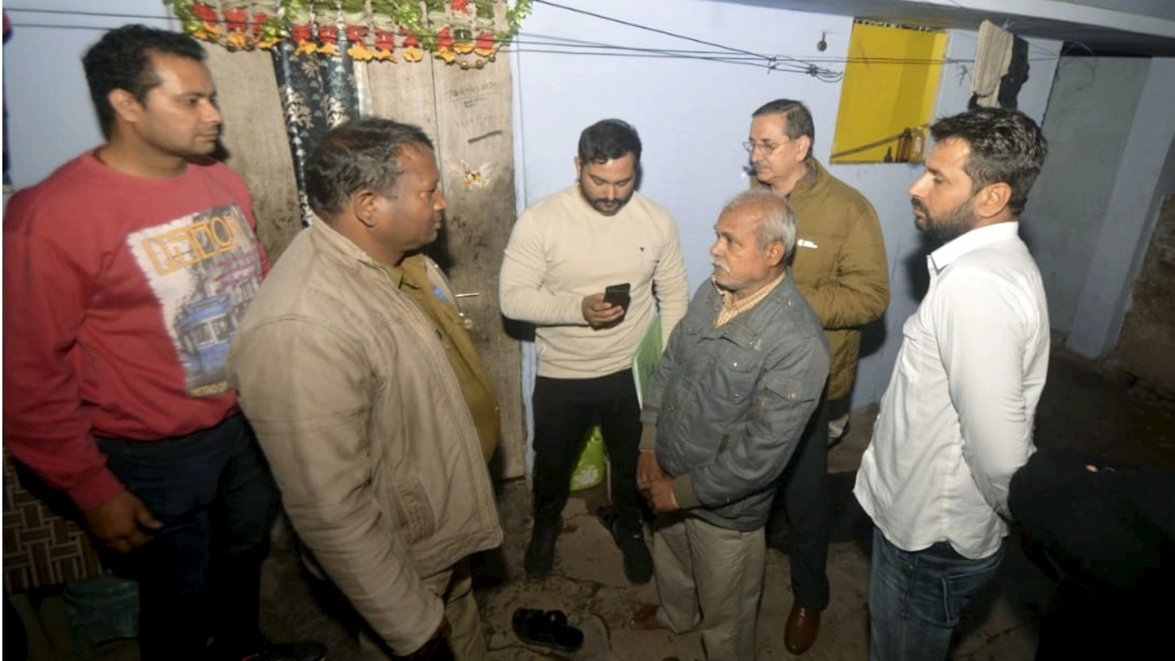 <div class="paragraphs"><p>Delhi Police personnel during their investigation at the house of Sagar Sharma, an accused of Parliament security breach, in Lucknow, Sunday, Dec 17, 2023. </p></div>