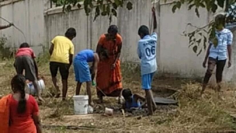 <div class="paragraphs"><p>A scene of cleaning the excrement pit by the children of Morarji Desai hostel in Malur taluk of Kolar district.</p></div>
