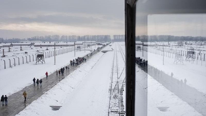 <div class="paragraphs"><p>Visitors at the Auschwitz-Birkenau Memorial and Museum in Poland. From 1942 to 1944, the Belgian railways sent 25,843 Jews and Roma people to Auschwitz, according to a report.</p></div>