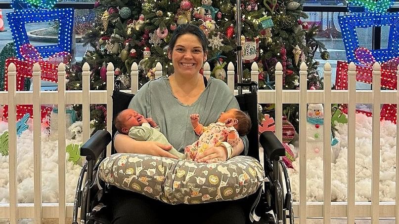 <div class="paragraphs"><p>Kelsey Hatcher with her newborns.&nbsp;</p></div>