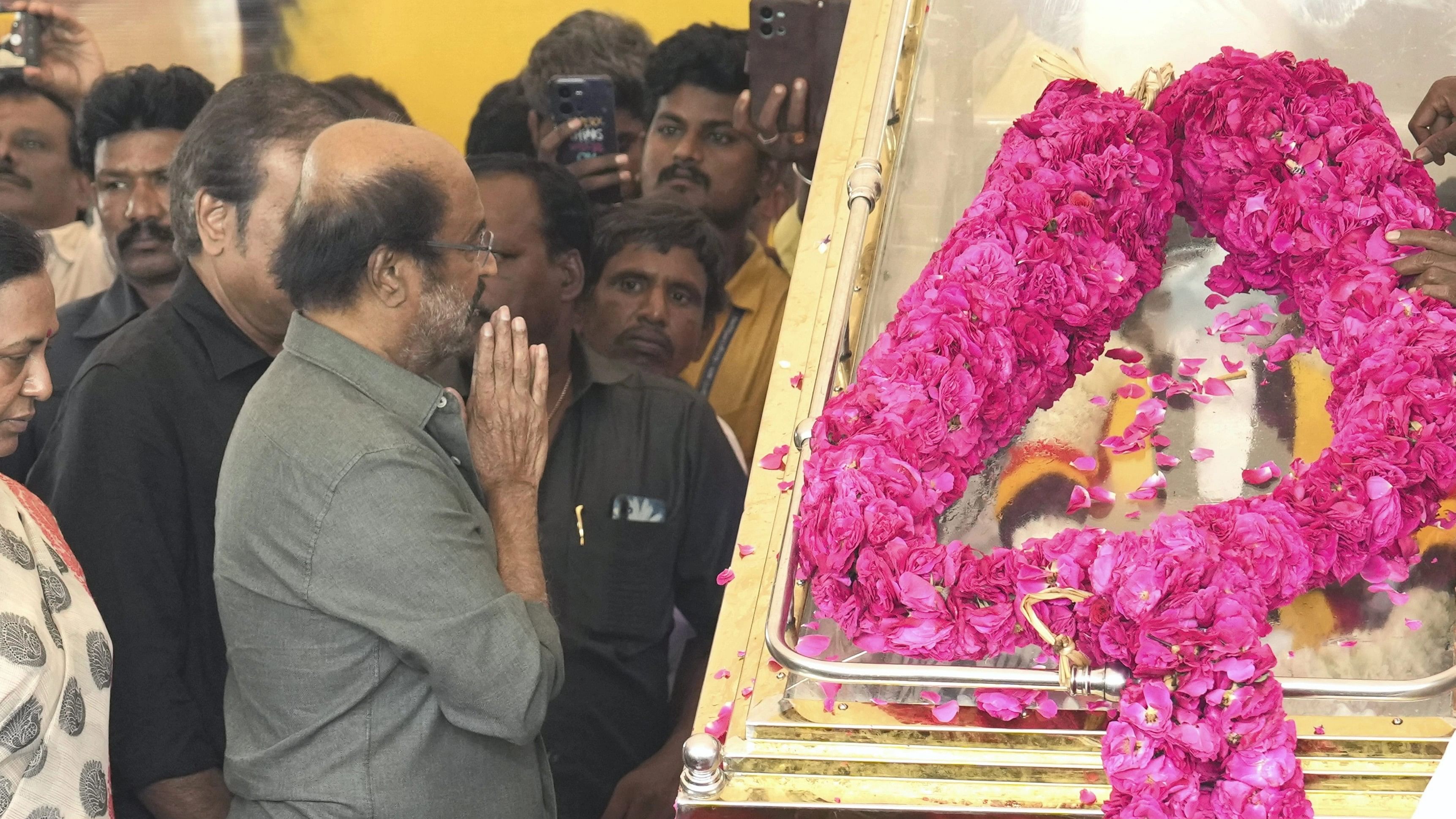 <div class="paragraphs"><p>Actor Rajinikanth pays his last respects to DMDK founder-leader Vijayakanth, at Island ground, in Chennai, Friday.</p></div>