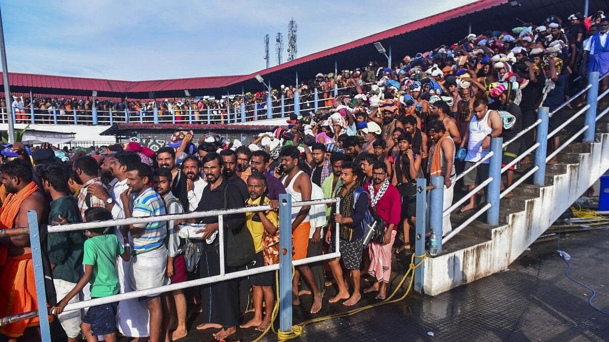 <div class="paragraphs"><p>Ayyappa devotees at Sabarimala temple, in Pathanamthitta, Monday.&nbsp;</p></div>