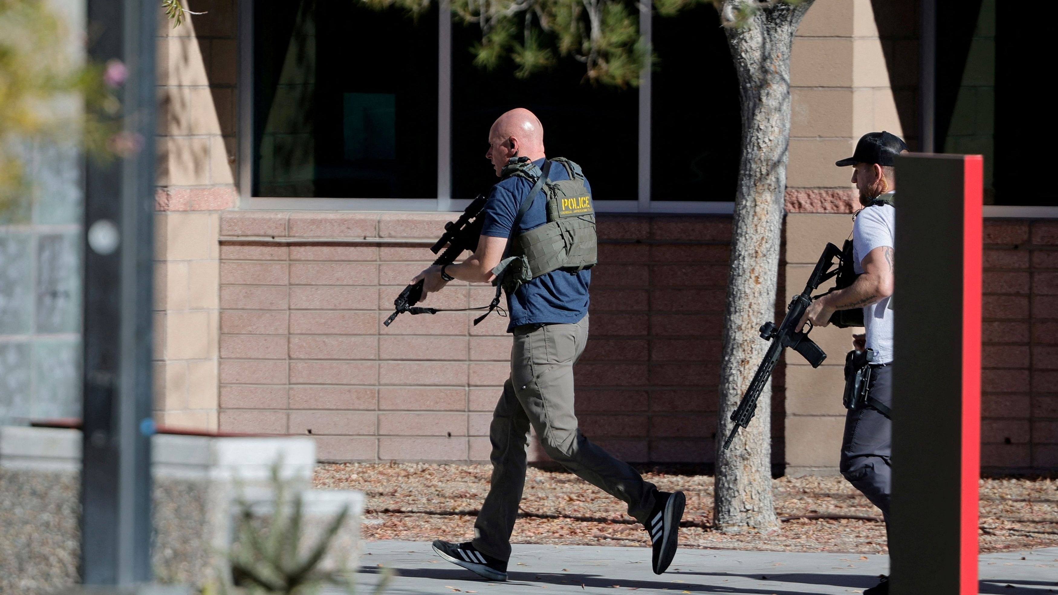 <div class="paragraphs"><p>Law enforcement officers head into UNLV campus after reports of an active shooter in Las Vegas, Nevada.</p></div>