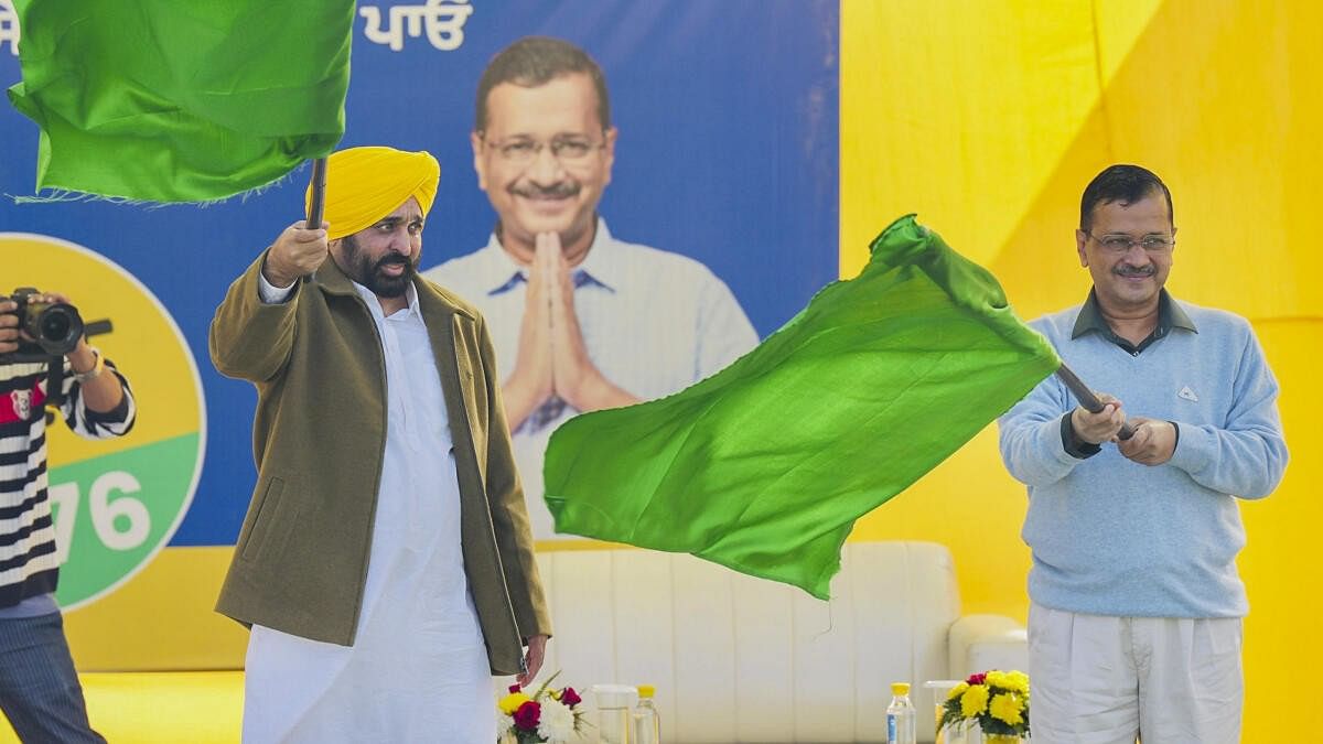 <div class="paragraphs"><p>Delhi Chief Minister Arvind Kejriwal and Punjab Chief Minister Bhagwant Mann during the launch of doorstep delivery of services scheme in Punjab, in Ludhiana, Sunday, Dec. 10, 2023.</p></div>