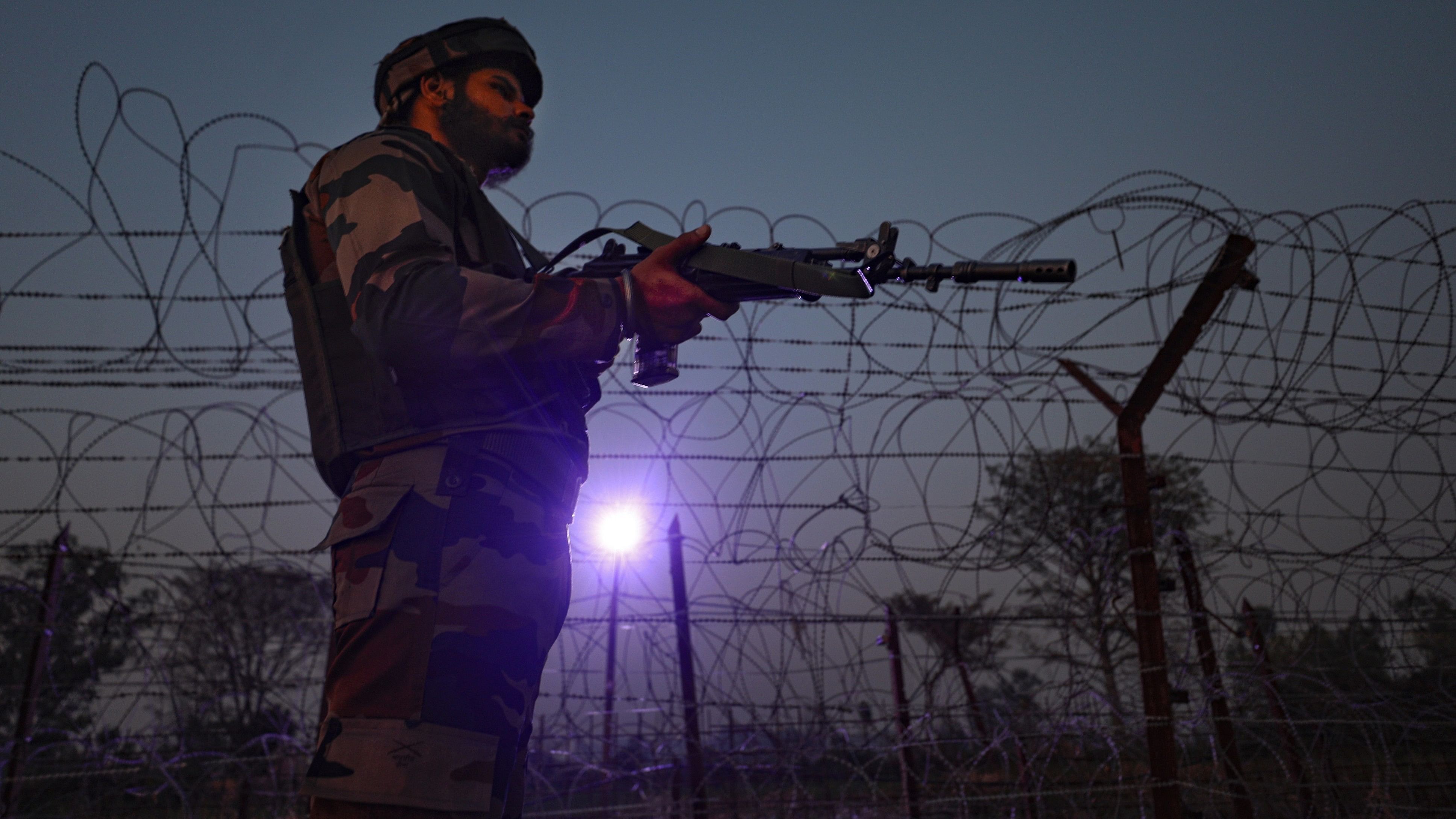 <div class="paragraphs"><p>Jammu: An Indian Army soldier stands guard near the Line of Control (LoC) after an infiltration attempt by four heavily-armed terrorists at Akhnoor, in Jammu district, Saturday, Dec. 23, 2023.</p></div>