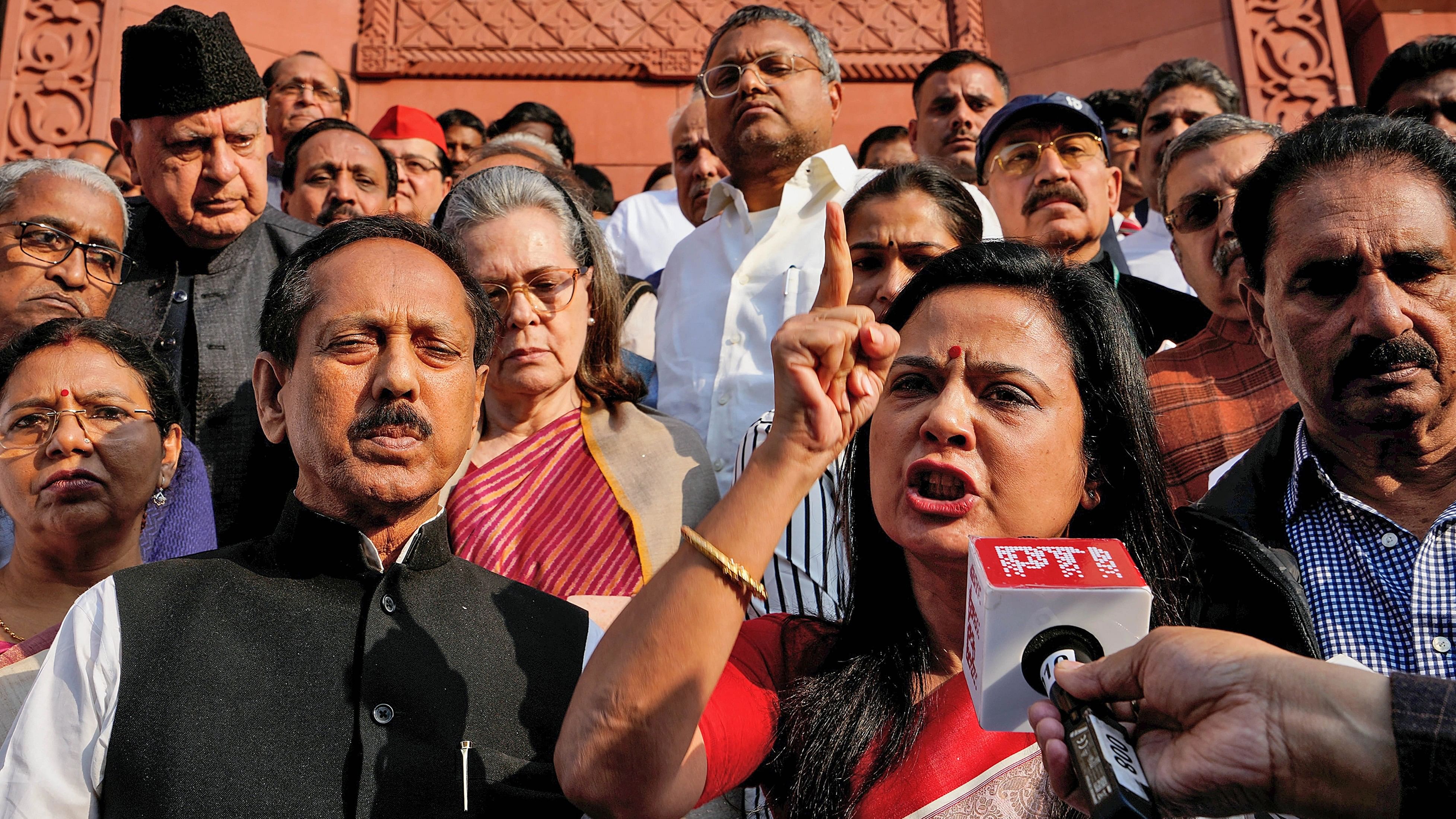 <div class="paragraphs"><p>TMC leader Mahua Moitra addresses the media with Congress MP Sonia Gandhi and other opposition leaders after being expelled by the Lok Sabha during the Winter session of Parliament, in New Delhi, Friday, Dec. 8, 2023. </p></div>