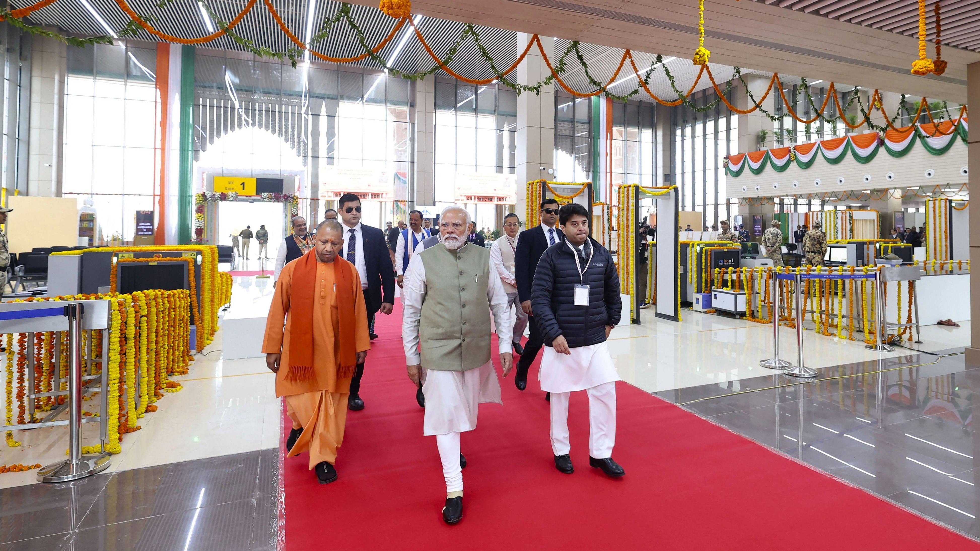 <div class="paragraphs"><p> Prime Minister Narendra Modi with Uttar Pradesh Chief Minister Yogi Adityanath and Union Civil Aviation Minister Jyotiraditya Scindia during the inauguration of Maharshi Valmiki International Airport, in Ayodhya, Saturday, Dec. 30, 2023. </p></div>