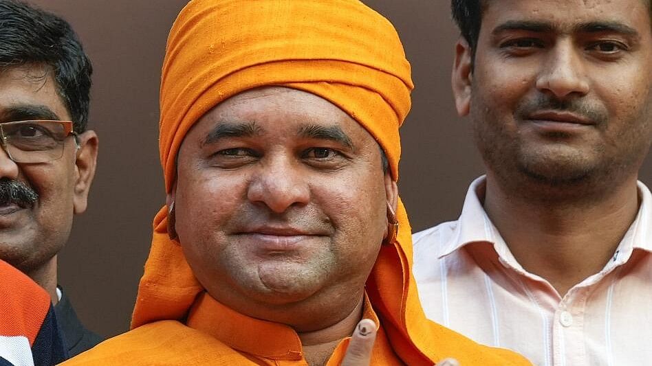 <div class="paragraphs"><p>BJP MP Mahant Balaknath on the first day of the Winter session of Parliament, in New Delhi.</p></div>