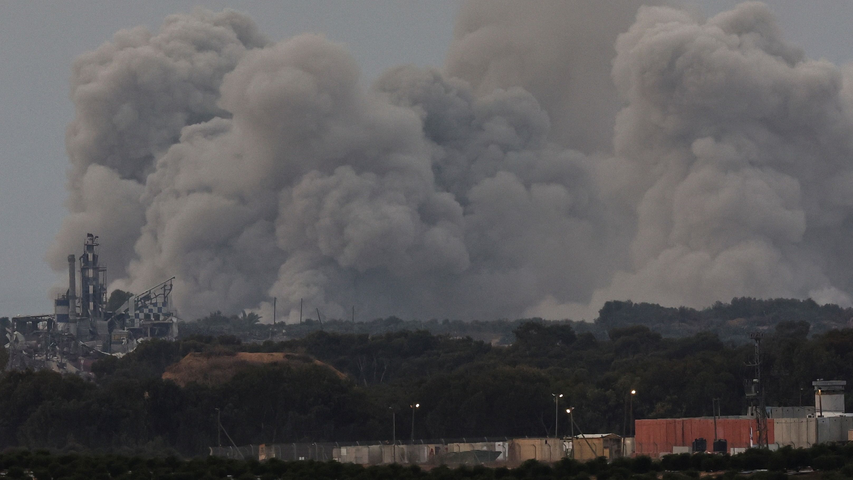 <div class="paragraphs"><p>Smoke rises over Gaza, amid the ongoing conflict between Israel and the Palestinian Islamist group Hamas, as seen from southern Israel, December 7, 2023.</p></div>