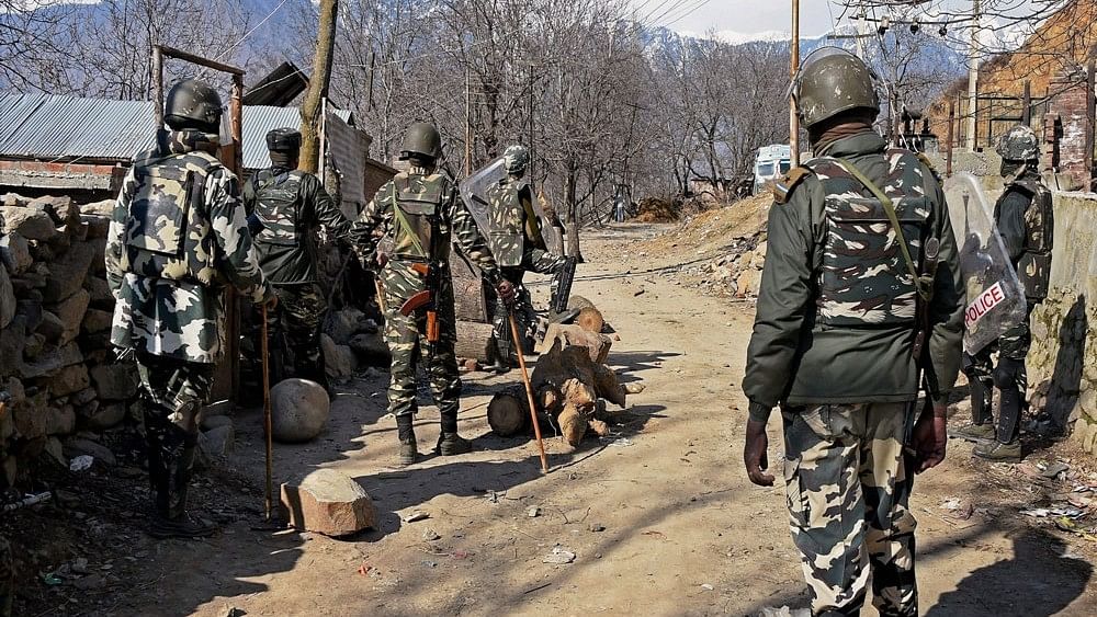 <div class="paragraphs"><p>Representative image of security personnel investigating the site where Naxals triggered an IED blast.</p></div>