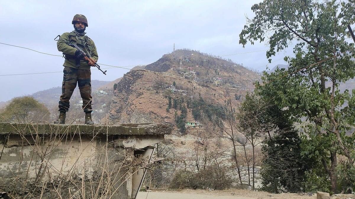 <div class="paragraphs"><p>An Army personnel during a cordon and search operation after the recent ambush on two Army vehicles that left five soldiers dead, in Poonch district, Saturday, Dec. 23, 2023.</p></div>