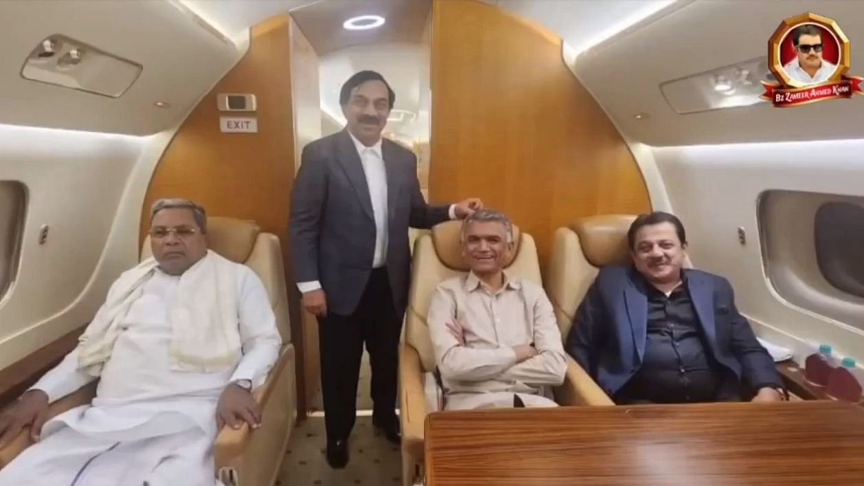 <div class="paragraphs"><p>Screengrab from video showing Karnataka CM Siddaramaiah (L) aboard a luxury jet.</p></div>