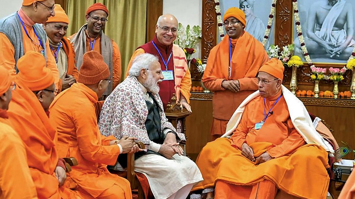 <div class="paragraphs"><p>File photo of PM Narendra Modi with monks at Belur Math in Howrah district.</p></div>
