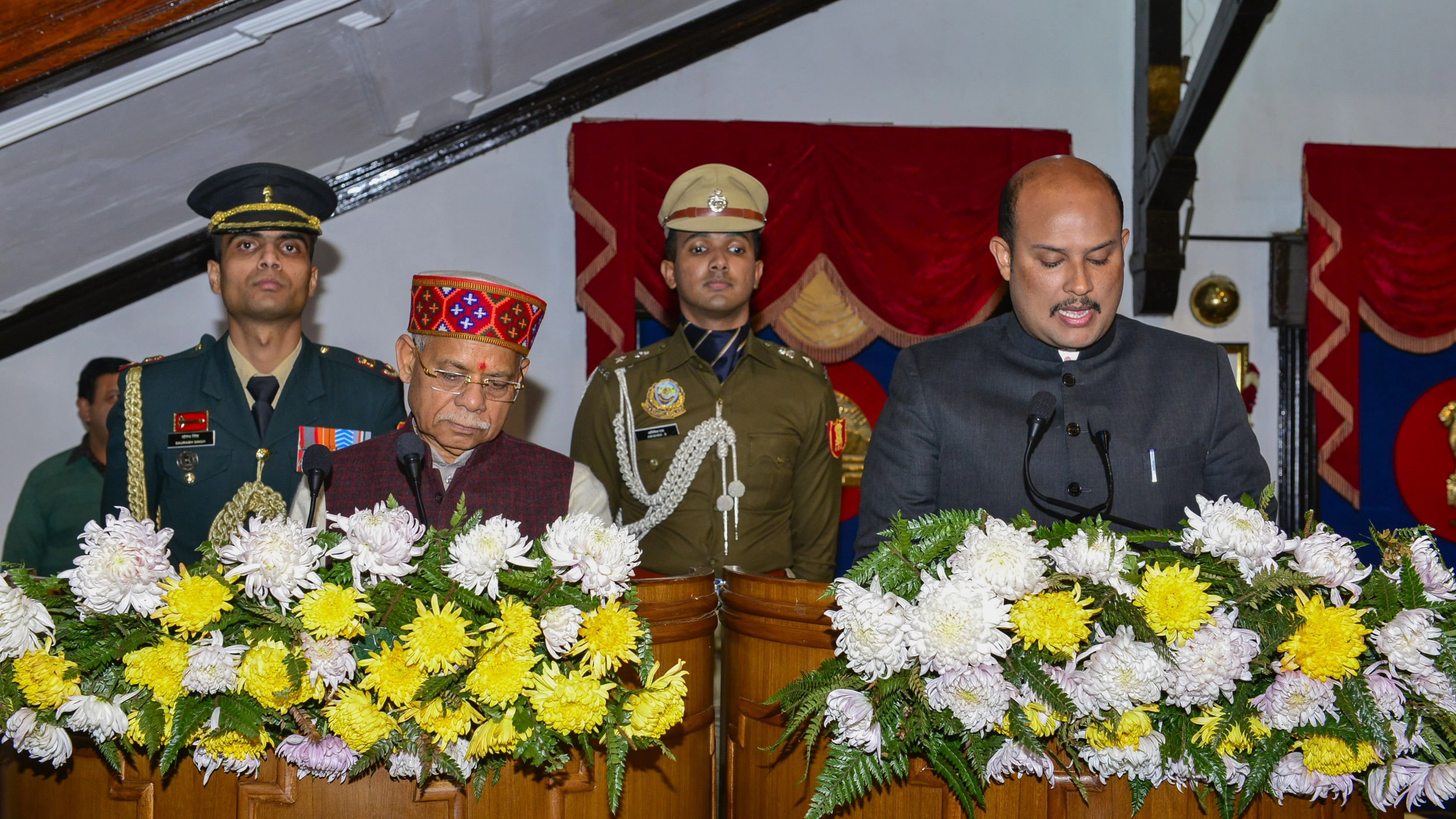 <div class="paragraphs"><p>Shimla: Himachal Pradesh Governor Shiv Pratap Shukla administers oath of office and secrecy to newly inducted cabinet minister Yadvinder Goma, at Raj Bhawan in Shimla.</p></div>