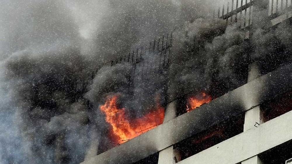 <div class="paragraphs"><p>Representative image of black smoke from fire in a building.</p></div>